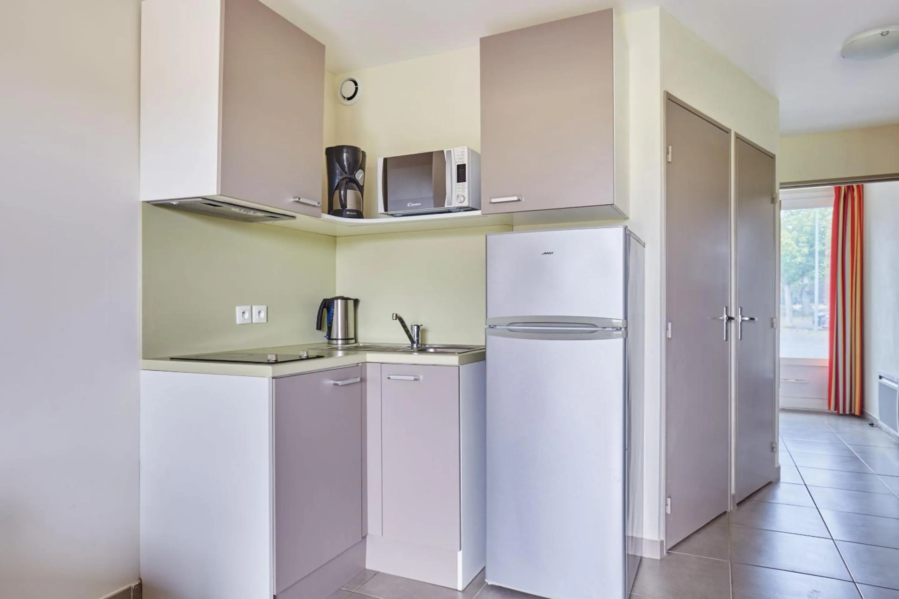 Kitchen or kitchenette in Résidence Odalys Côté Canal