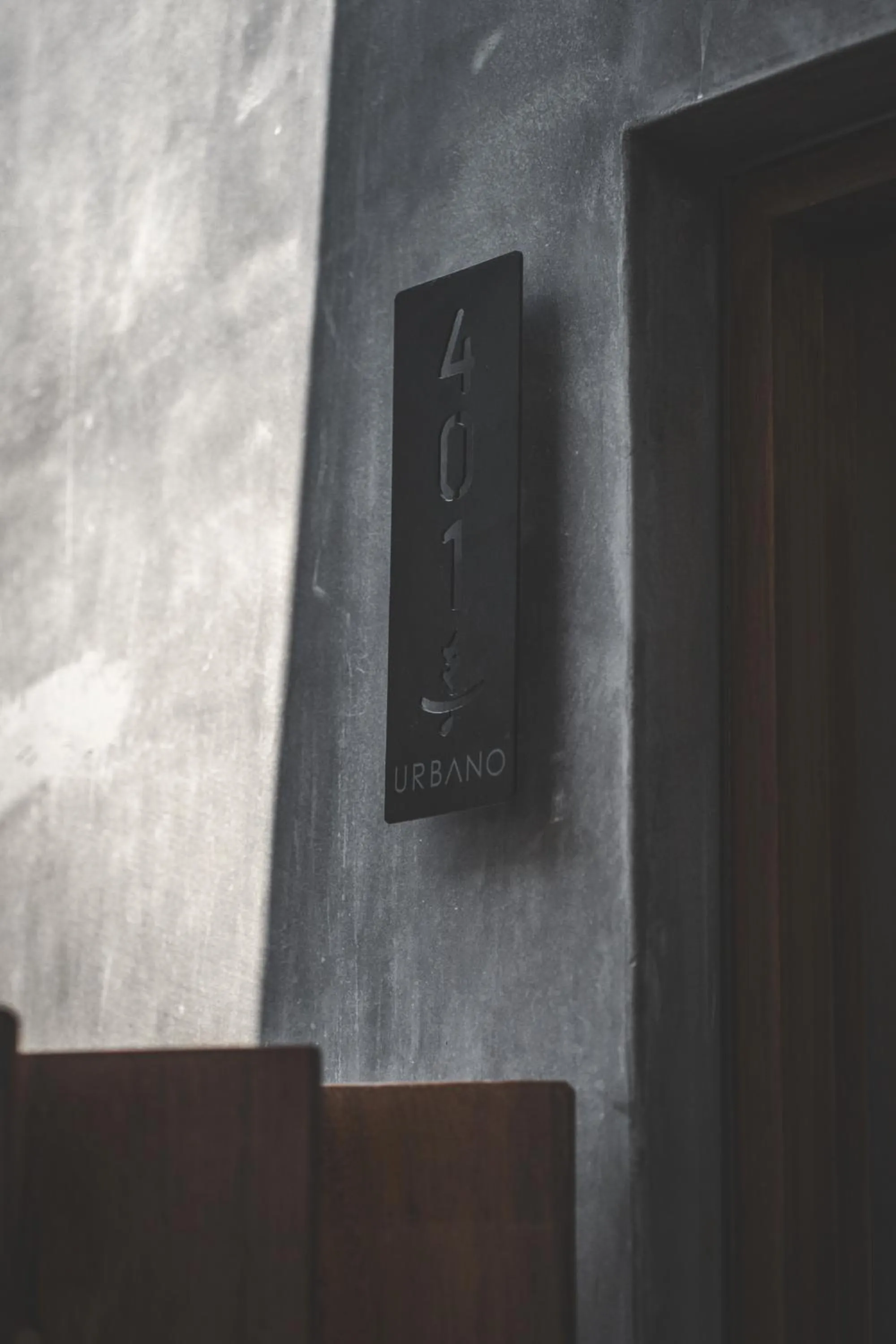 Property logo or sign in Urbano by Sundara