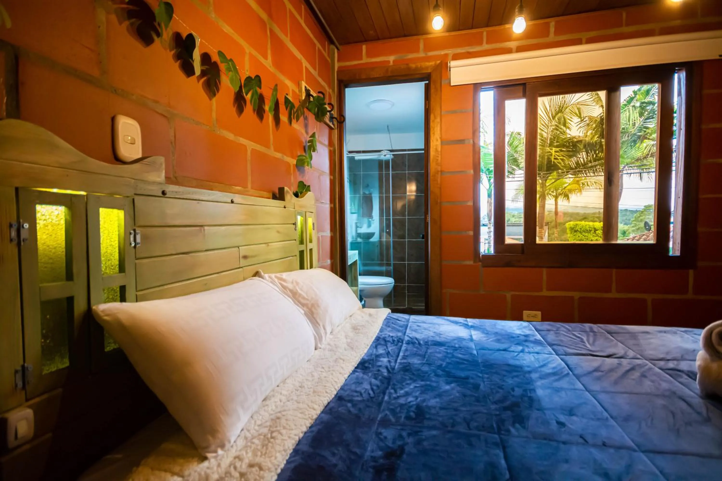 Bed in Hotel Spa Bliss Guatape