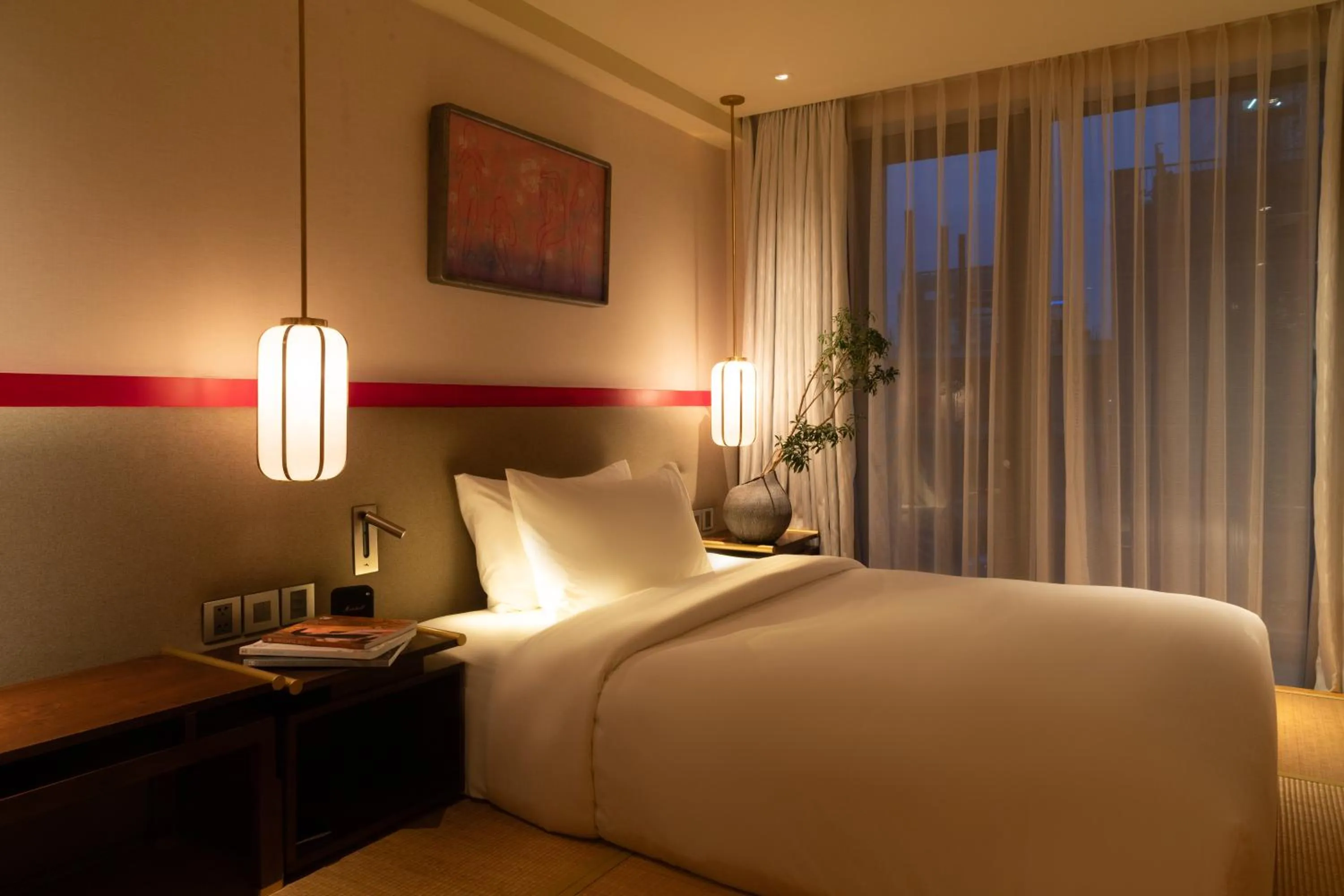 Bed in Suzu Saigon - A Boutique Hotel