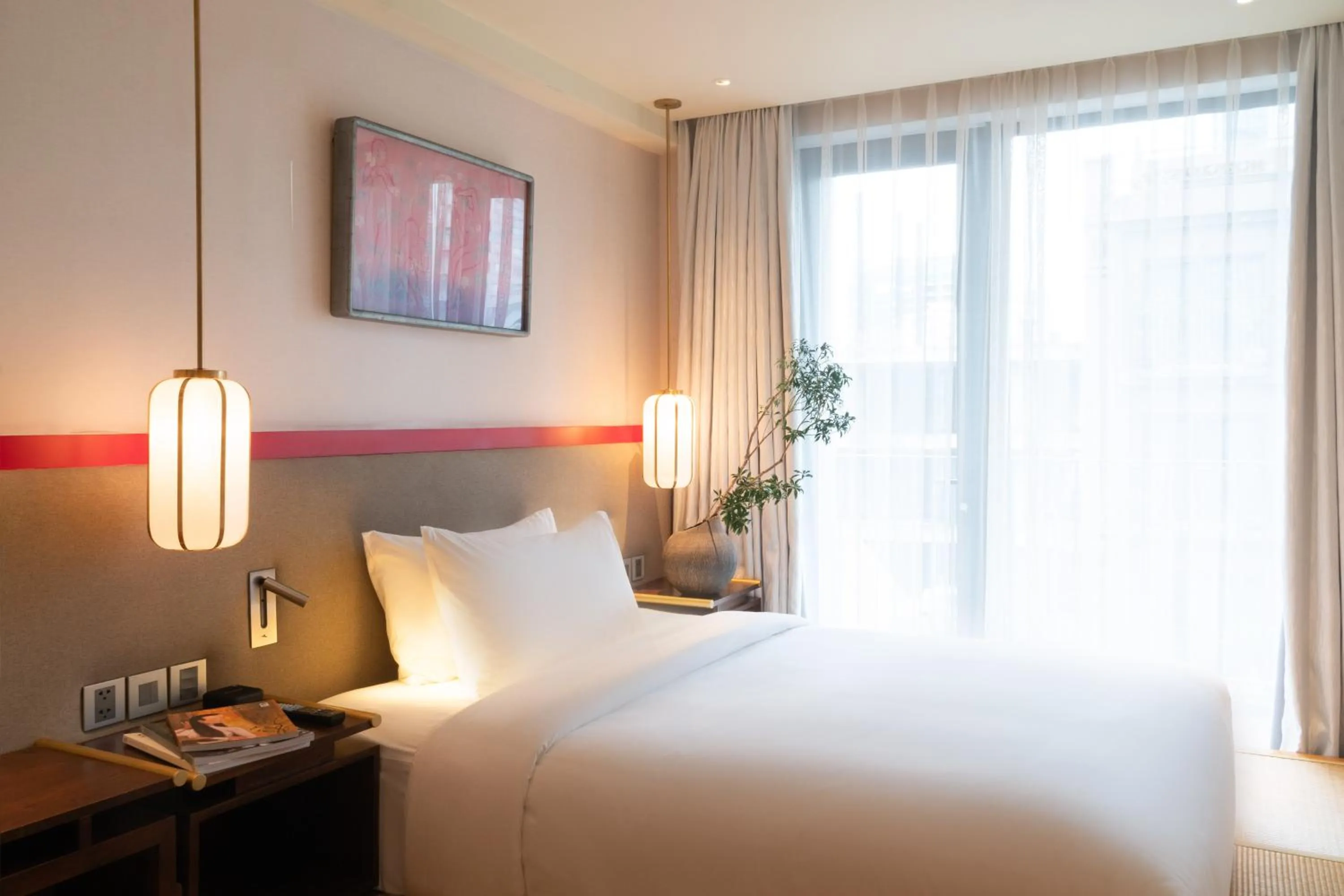 Bed in Suzu Saigon - A Boutique Hotel