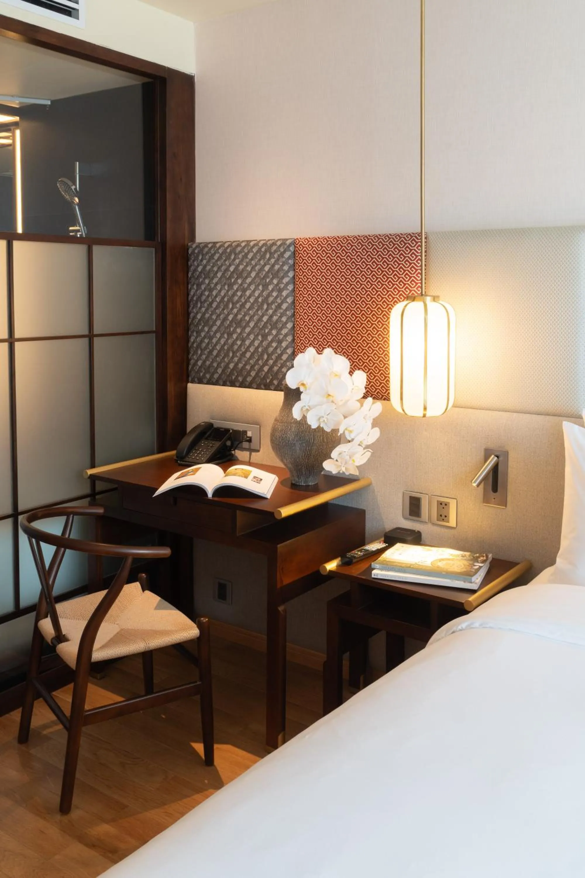 Bed in Suzu Saigon - A Boutique Hotel