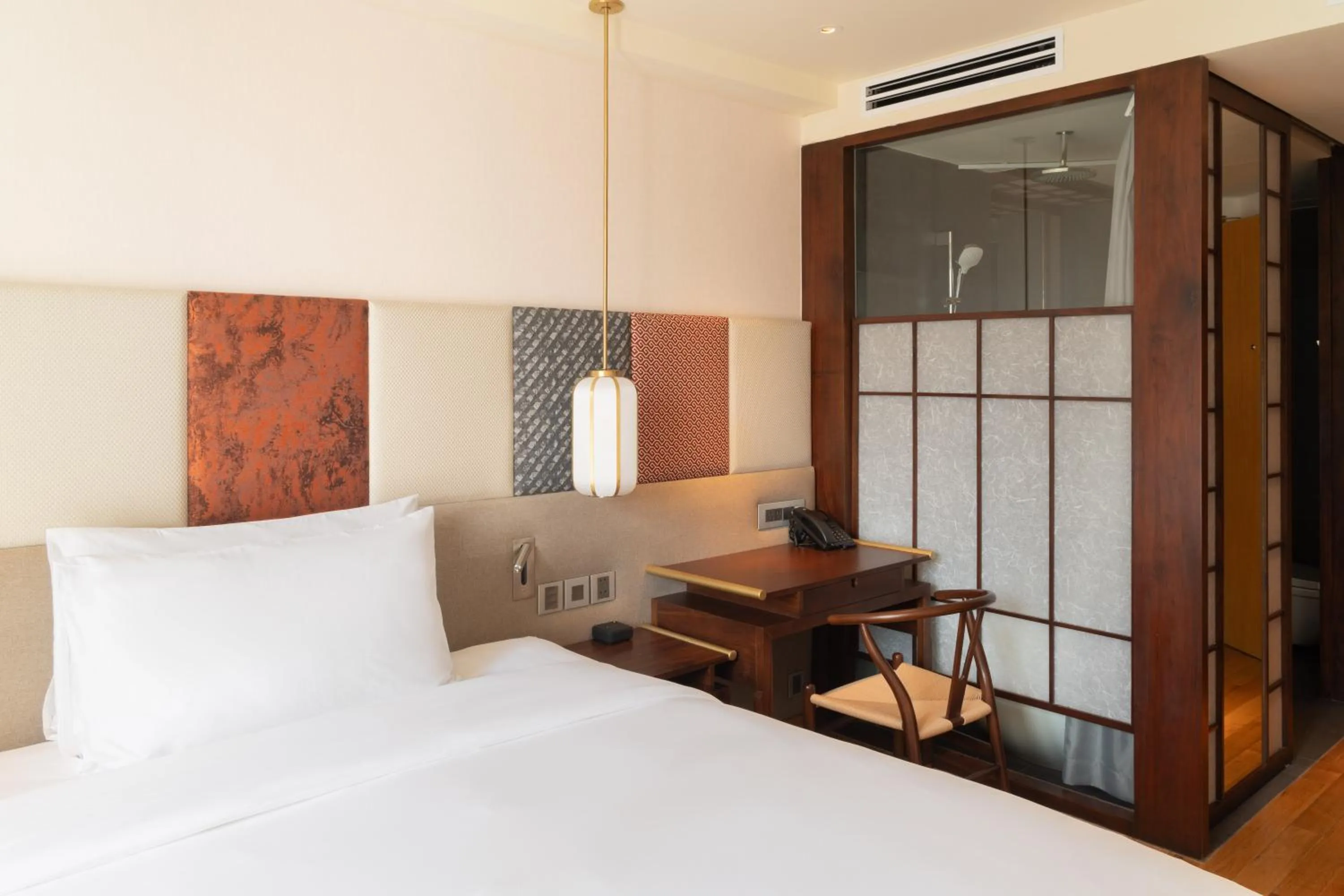 Bed in Suzu Saigon - A Boutique Hotel
