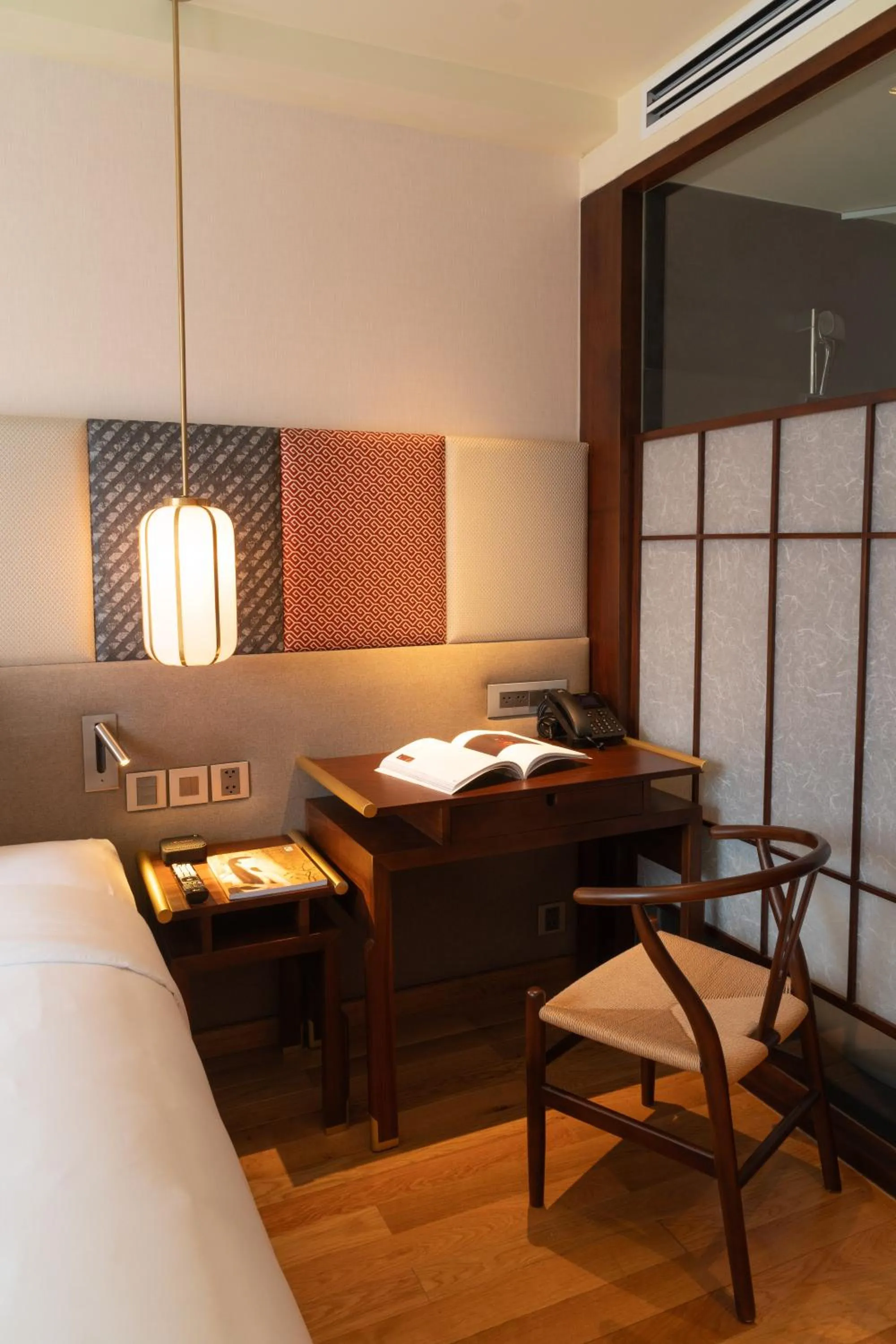 Bed in Suzu Saigon - A Boutique Hotel
