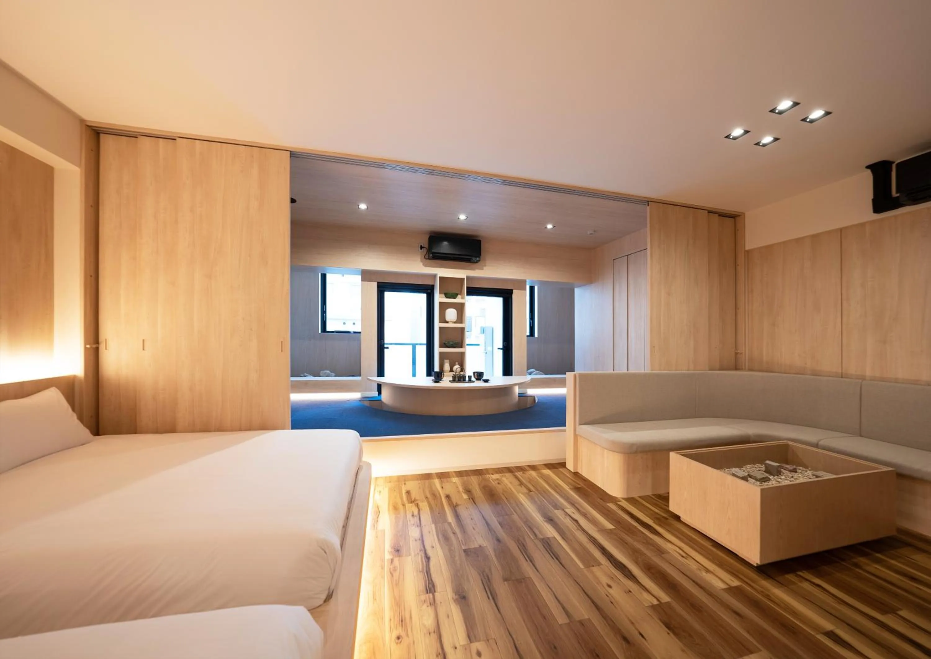 Living room, Bed in UH Suite Namba Station