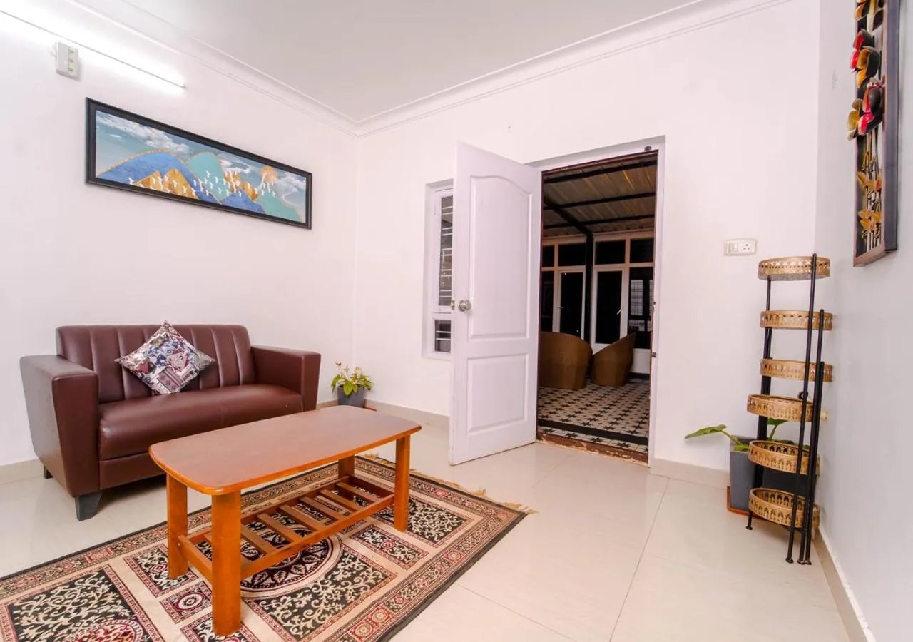 Living room in Silent Retreat Ooty Pool Resort by VOYE HOMES