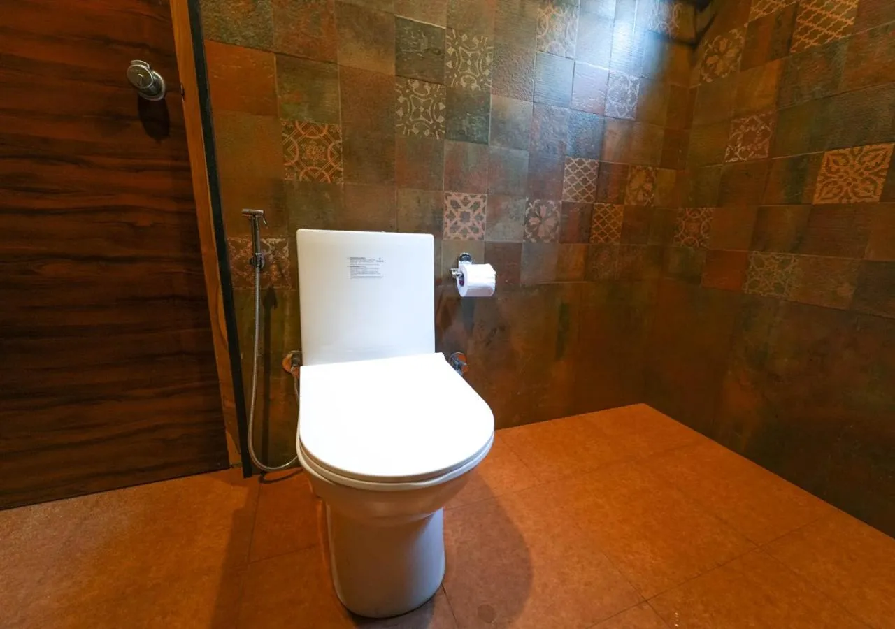 Shower in Silent Retreat Ooty Pool Resort by VOYE HOMES