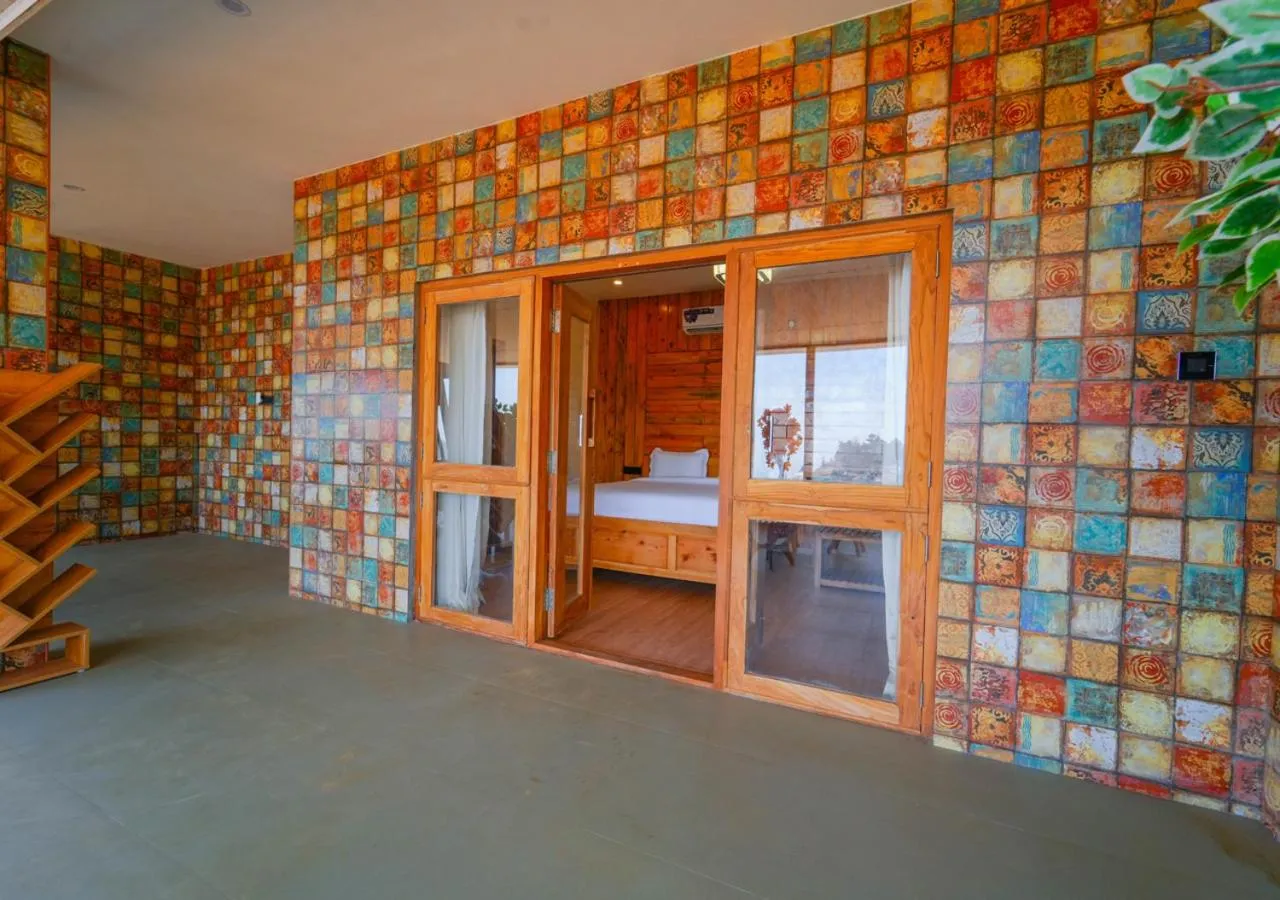 Bed in Silent Retreat Ooty Pool Resort by VOYE HOMES