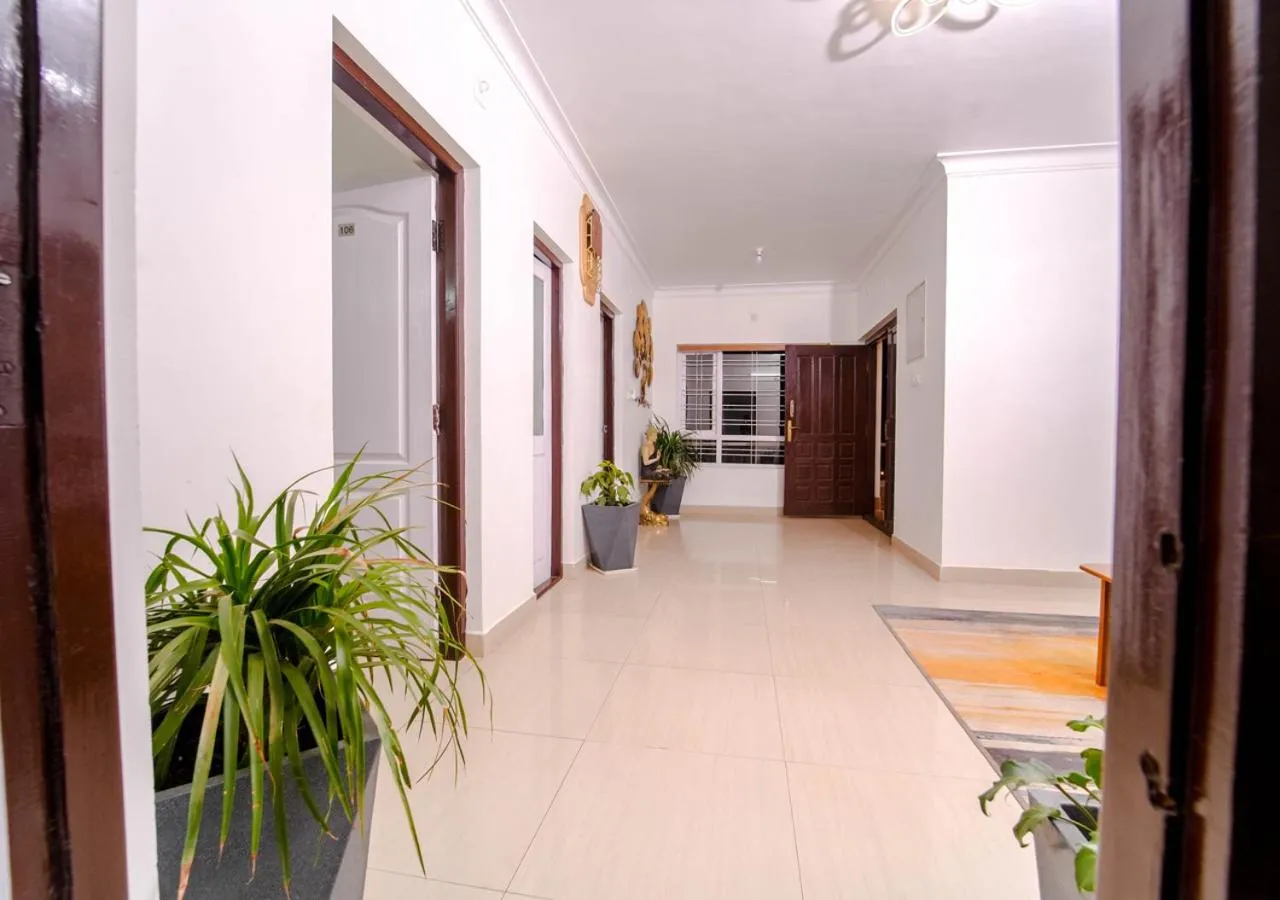 Living room in Silent Retreat Ooty Pool Resort by VOYE HOMES