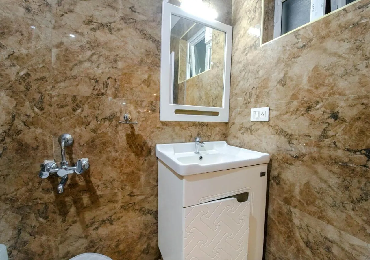 Shower in Silent Retreat Ooty Pool Resort by VOYE HOMES