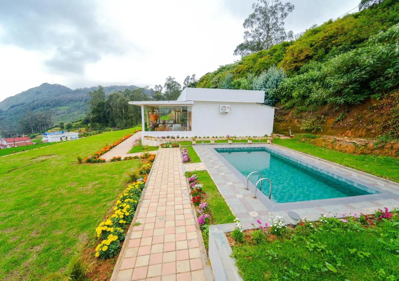 Property building in Silent Retreat Ooty Pool Resort by VOYE HOMES