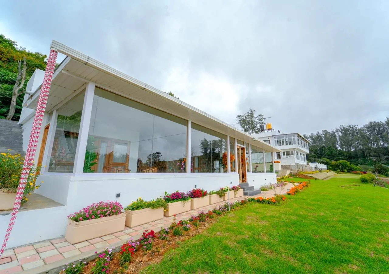 Property building in Silent Retreat Ooty Pool Resort by VOYE HOMES