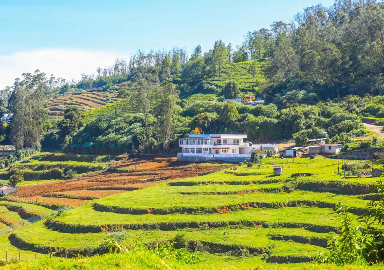 Property building in Silent Retreat Ooty Pool Resort by VOYE HOMES