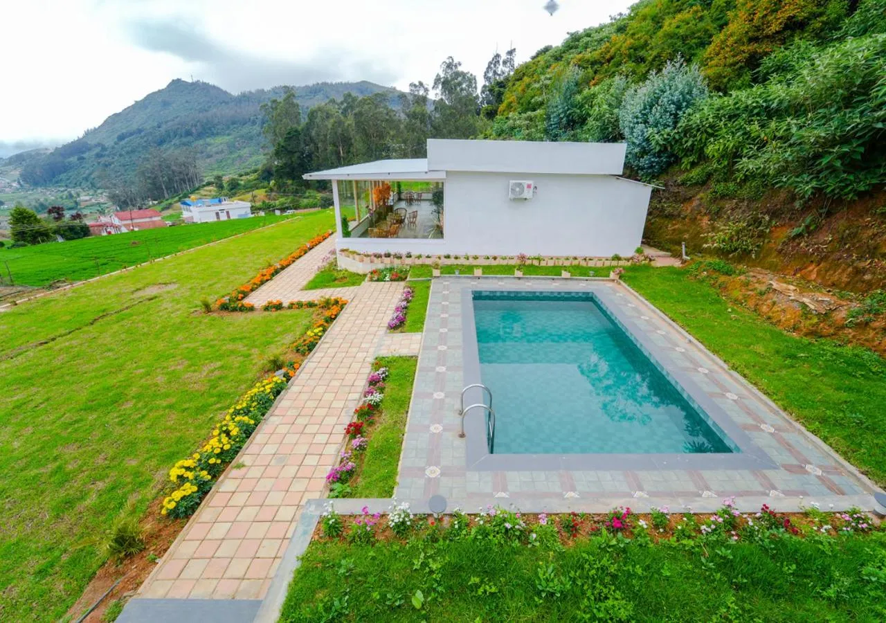 Property building in Silent Retreat Ooty Pool Resort by VOYE HOMES