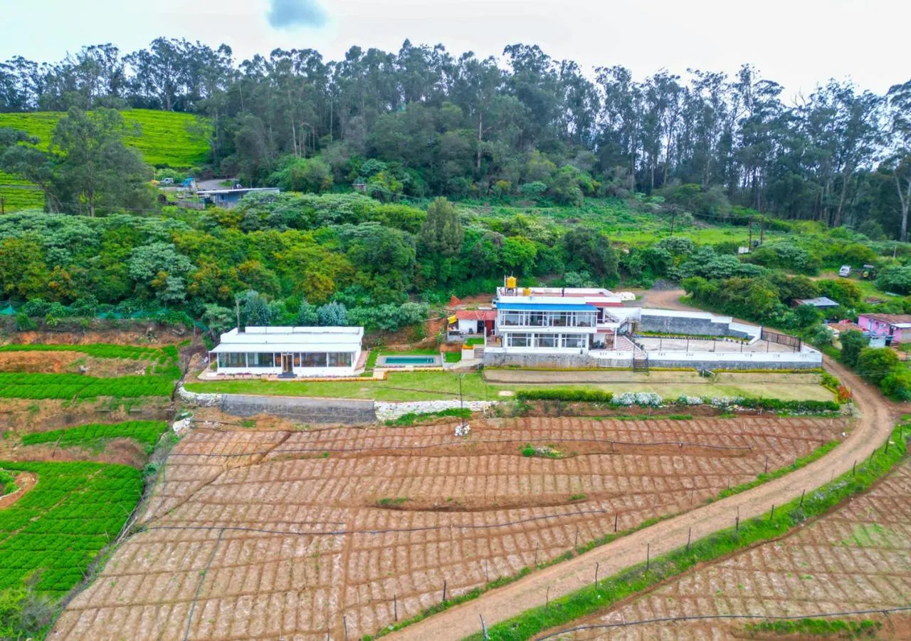 Property building in Silent Retreat Ooty Pool Resort by VOYE HOMES
