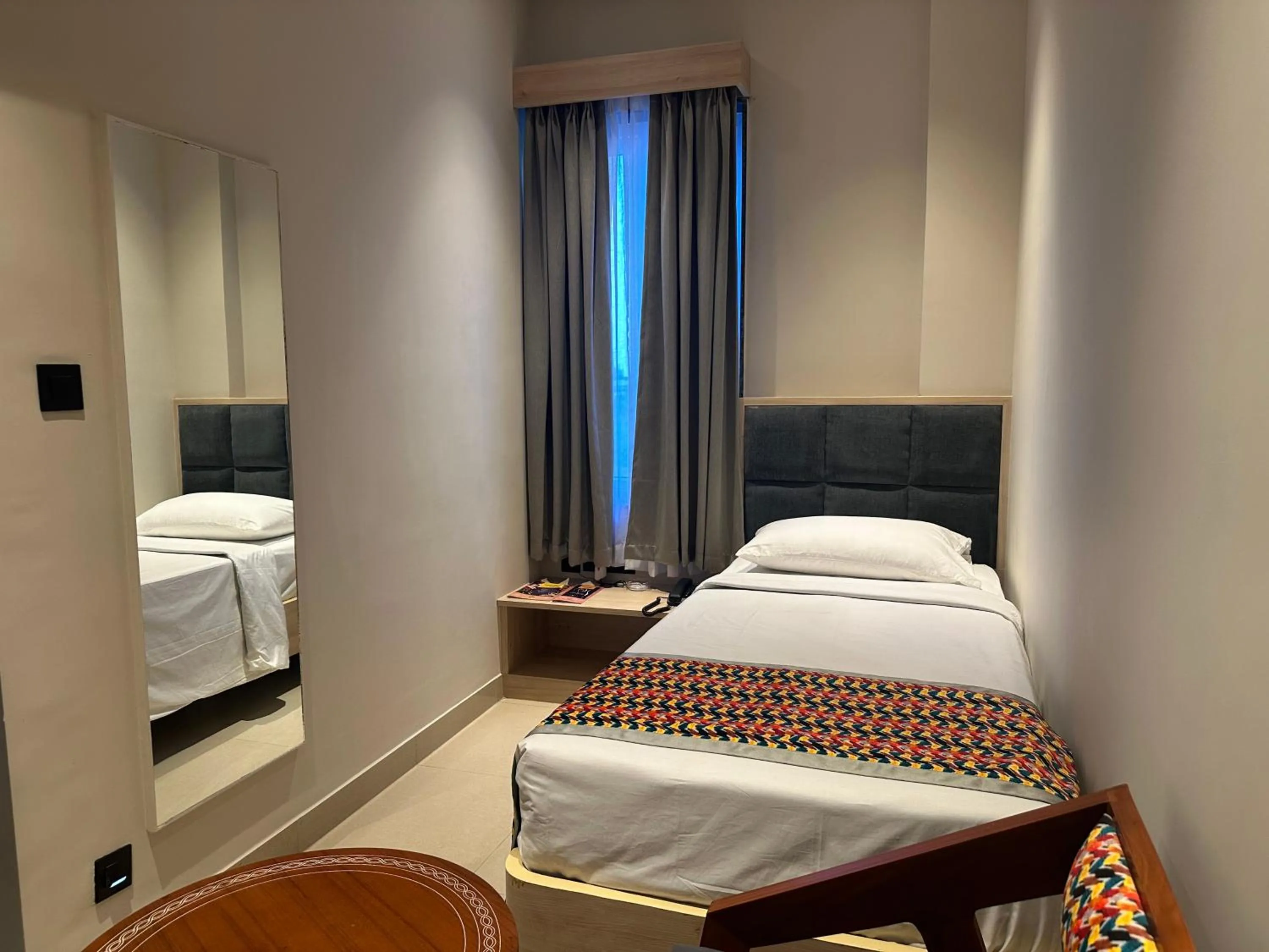 Bed in The Citi Residenci Hotel, Banskopa