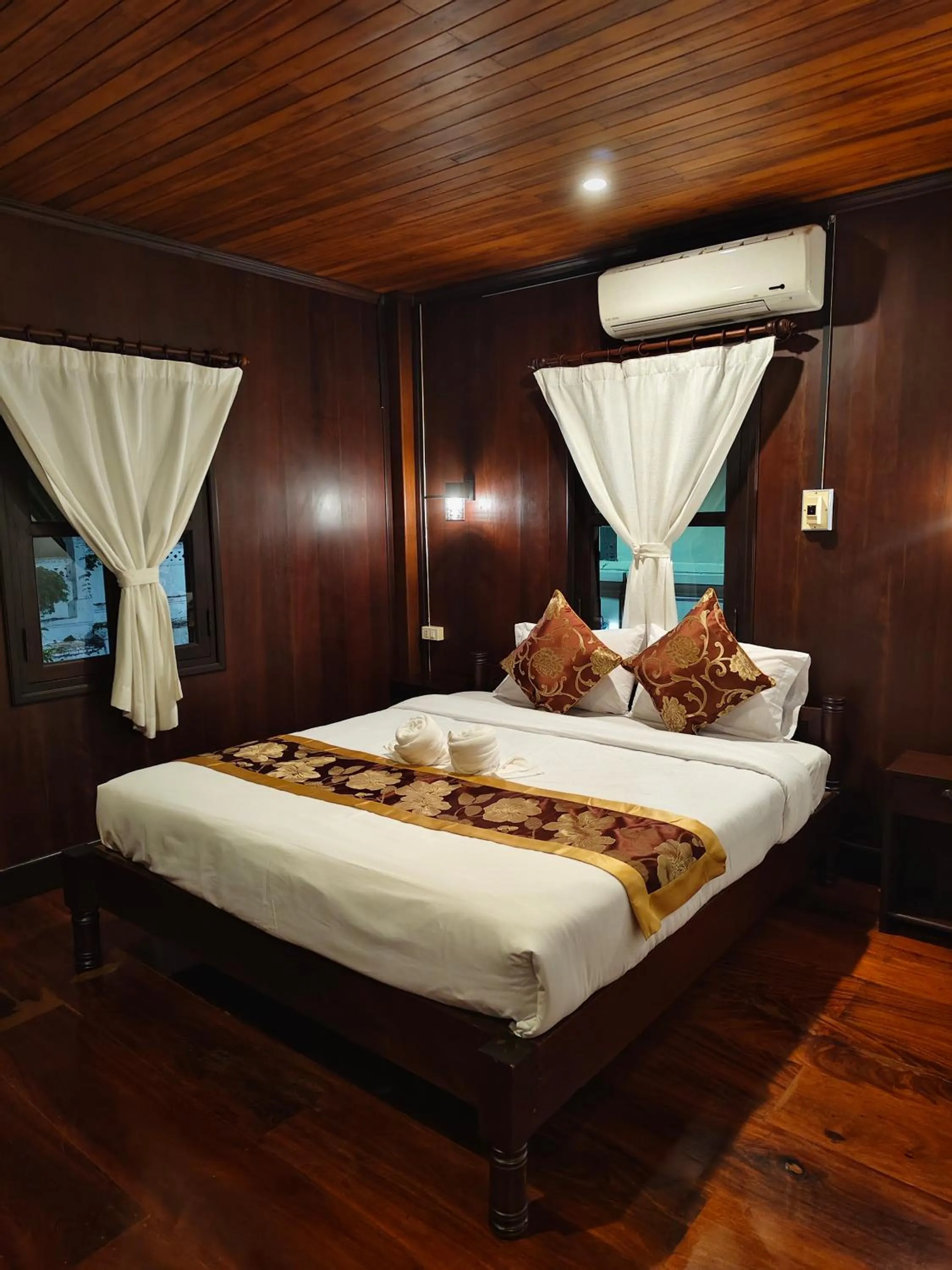 Bed in Bouakham Chanthasack Guesthouse