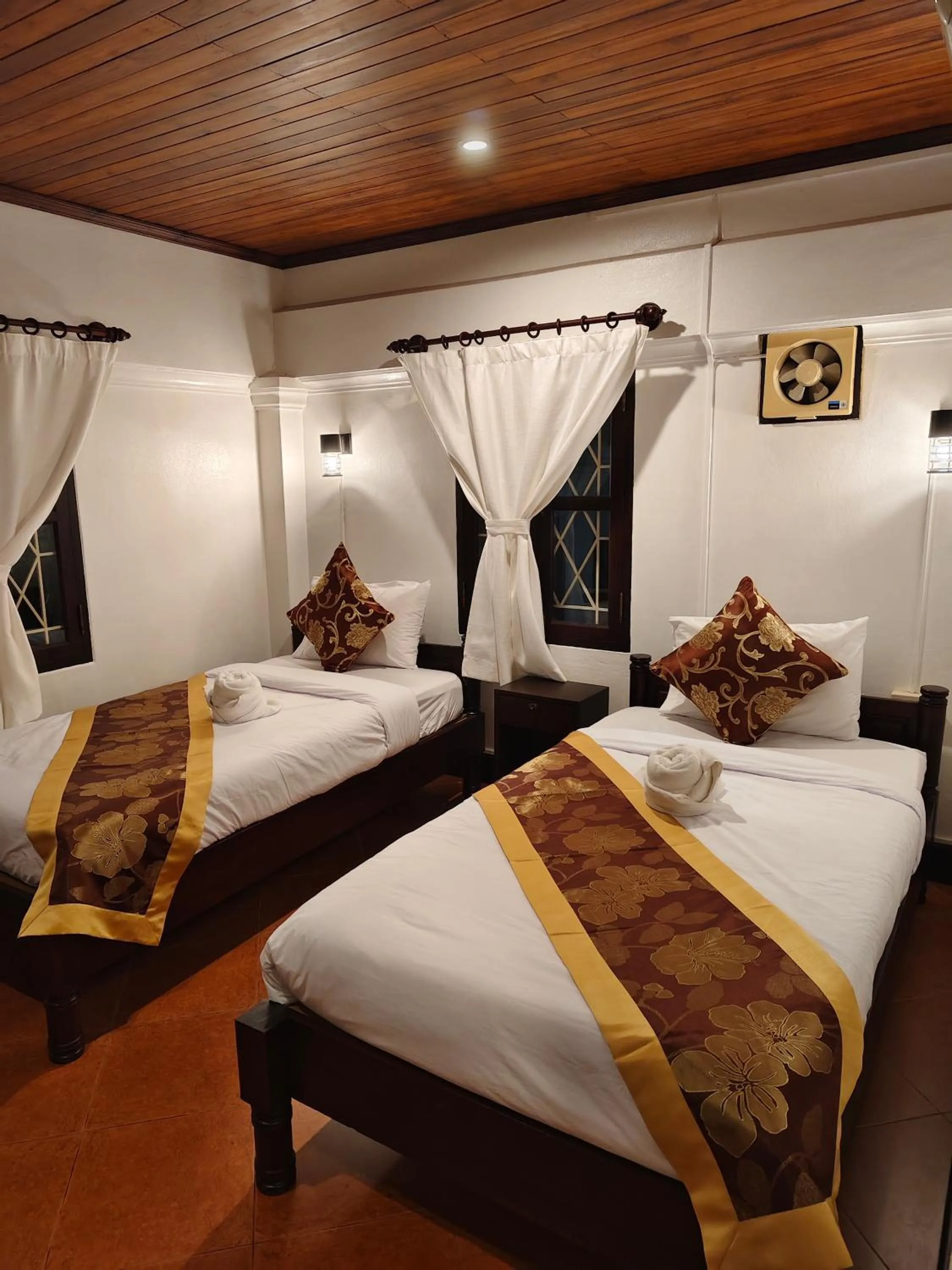 Bed in Bouakham Chanthasack Guesthouse