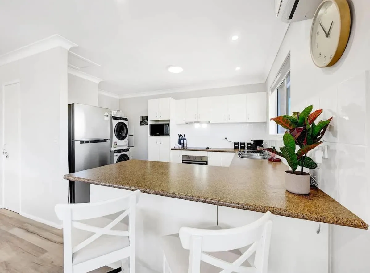 Kitchen or kitchenette in Waterfront Serenity - Steps from Mooloolaba Beach