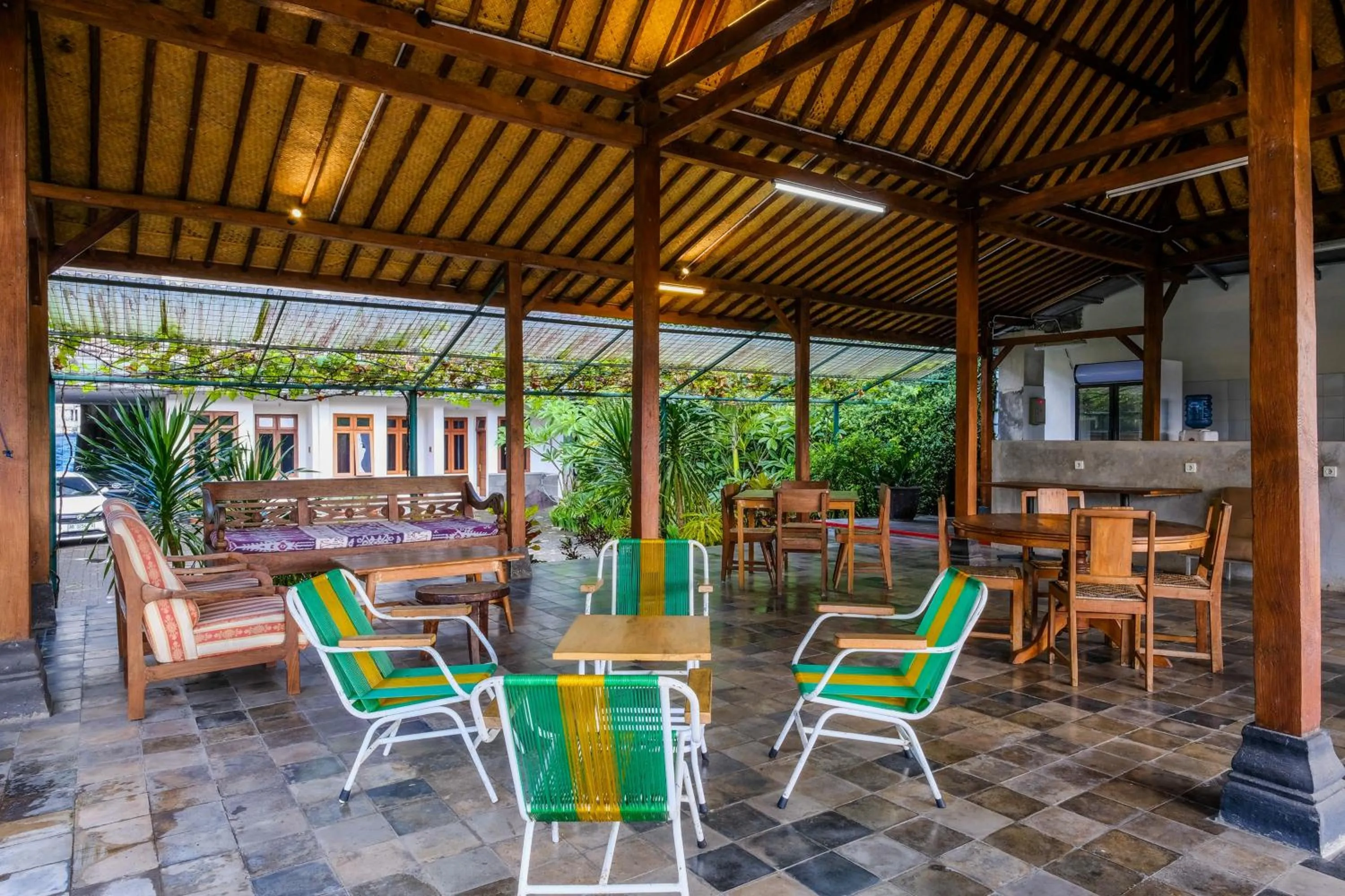 Seating area in Urbanview Code Riverstay Yogyakarta