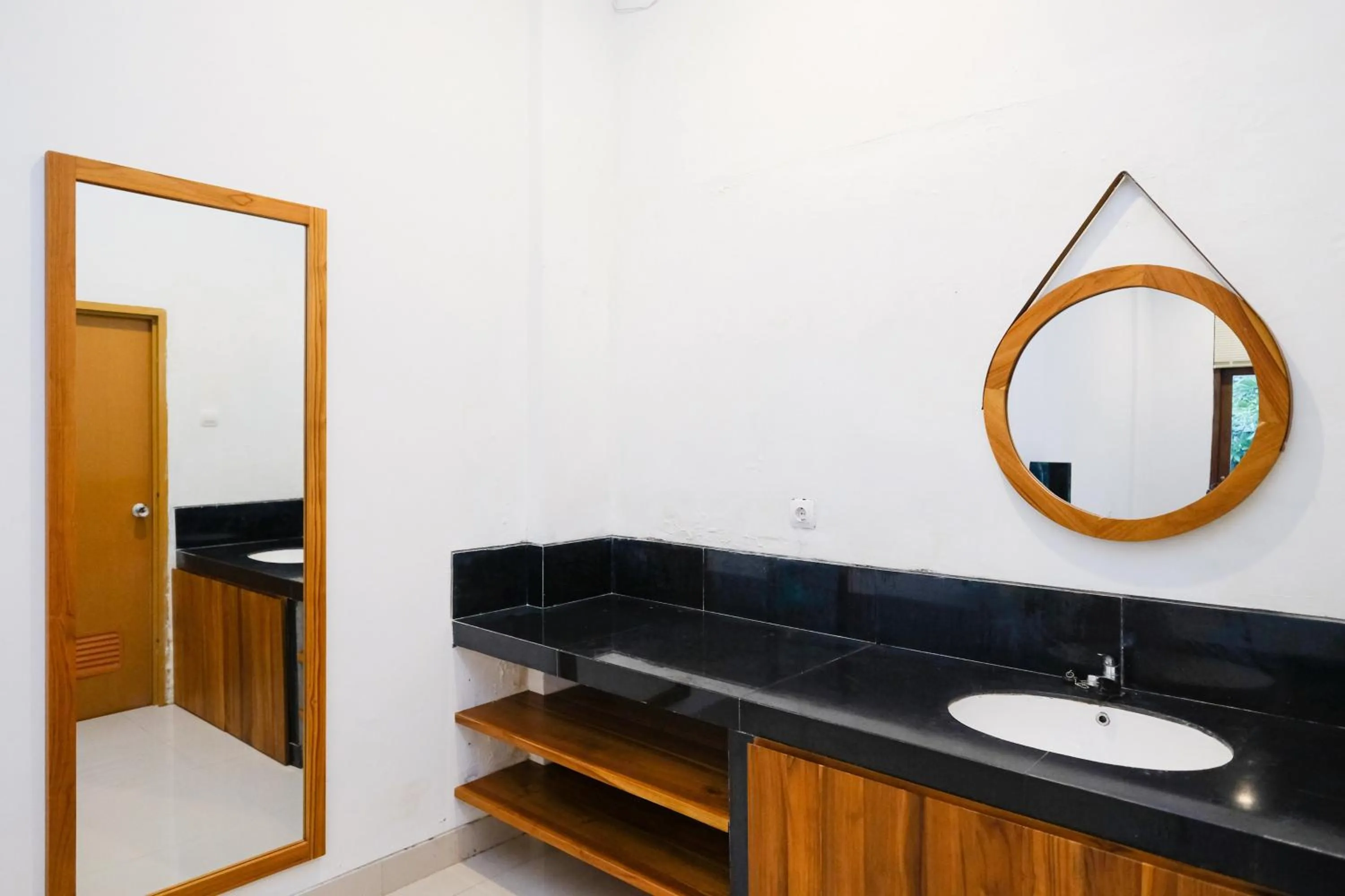 Bathroom in Urbanview Code Riverstay Yogyakarta