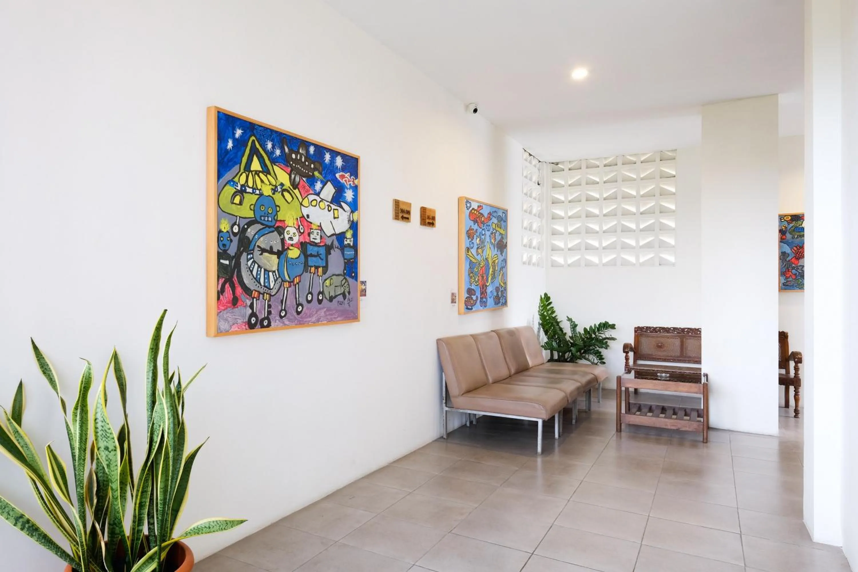 Seating area in Urbanview Code Riverstay Yogyakarta