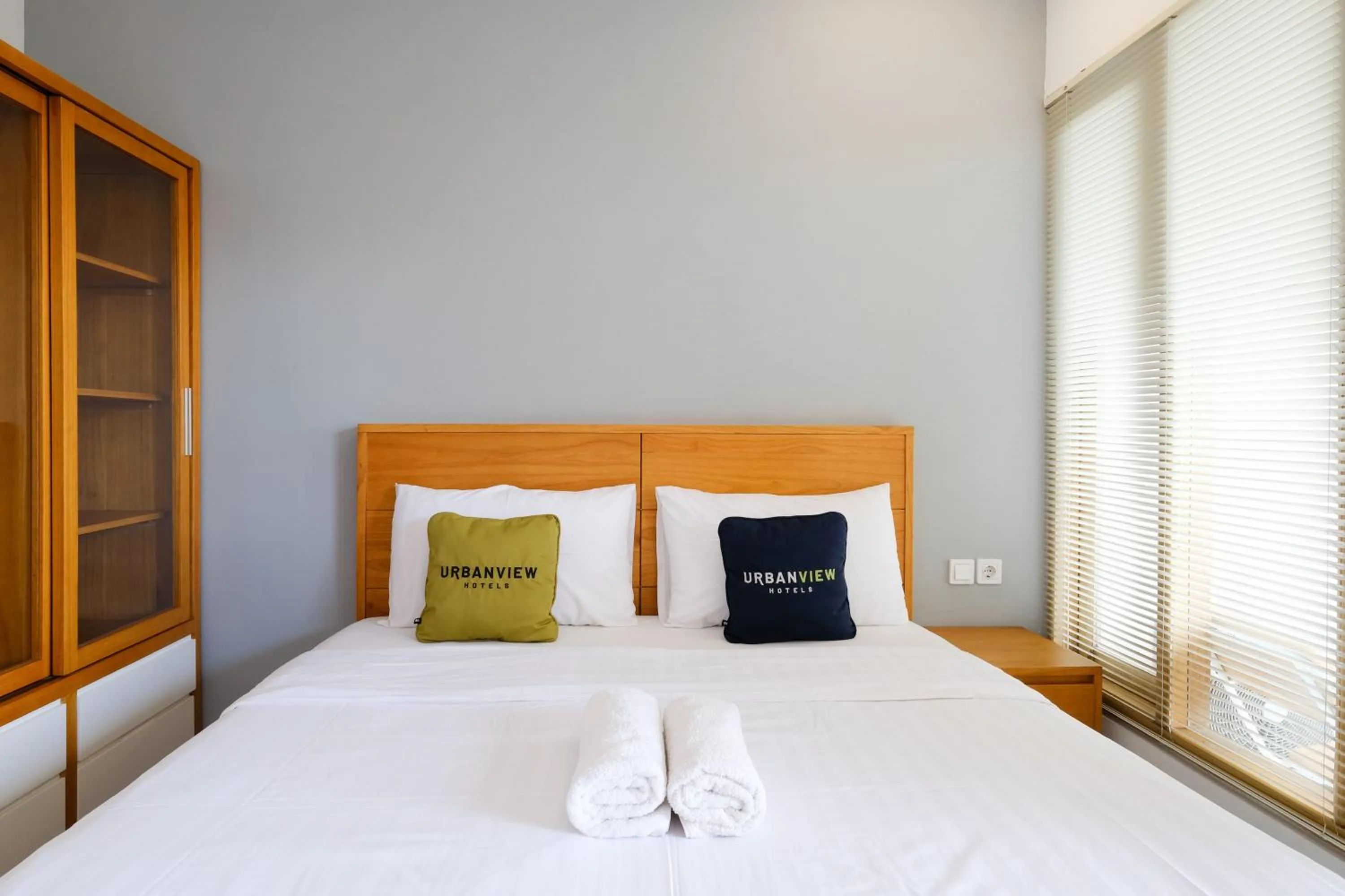 Bedroom, Bed in Urbanview Code Riverstay Yogyakarta