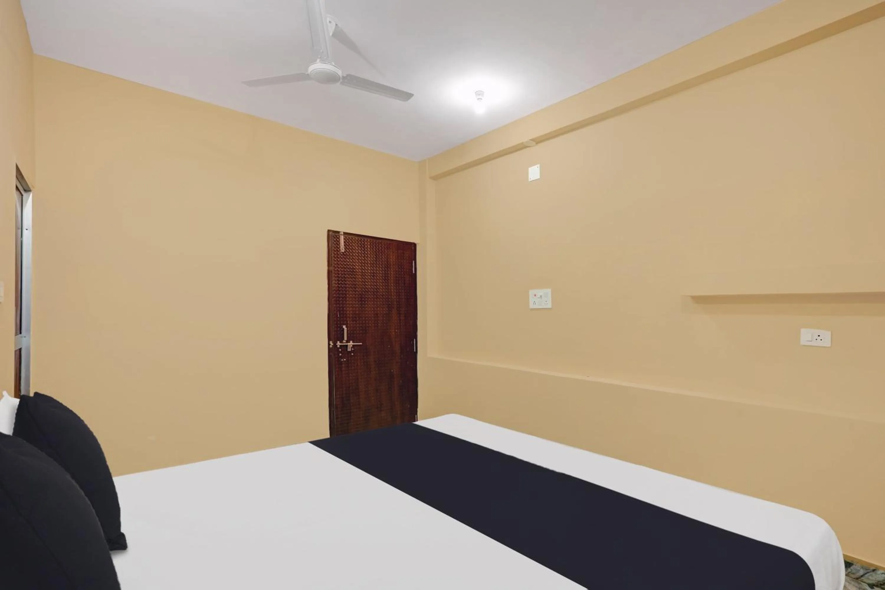 Bedroom in Hotel O Mayur Residency