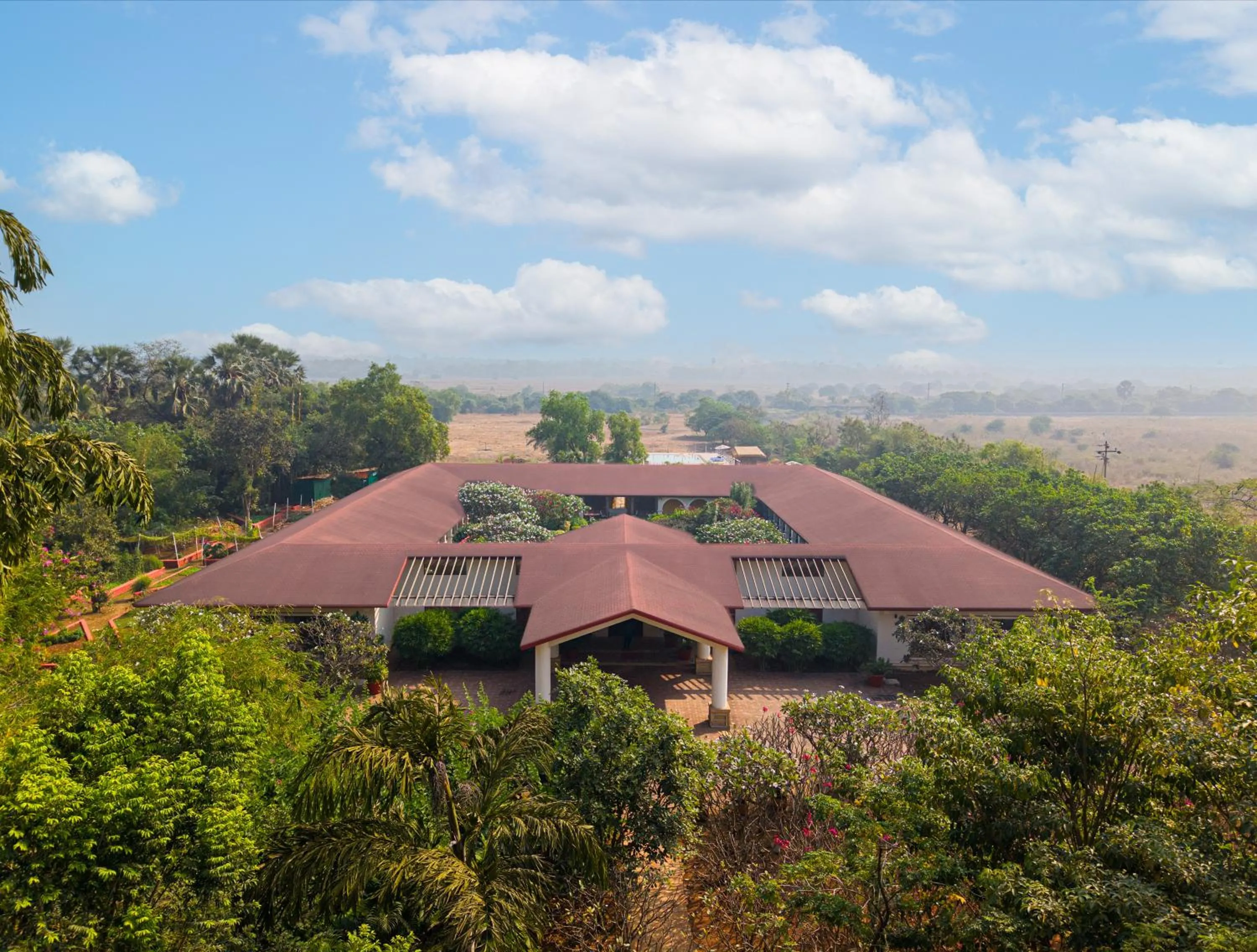 Property building in amã Stays & Trails Kihim Courtyard, Alibag