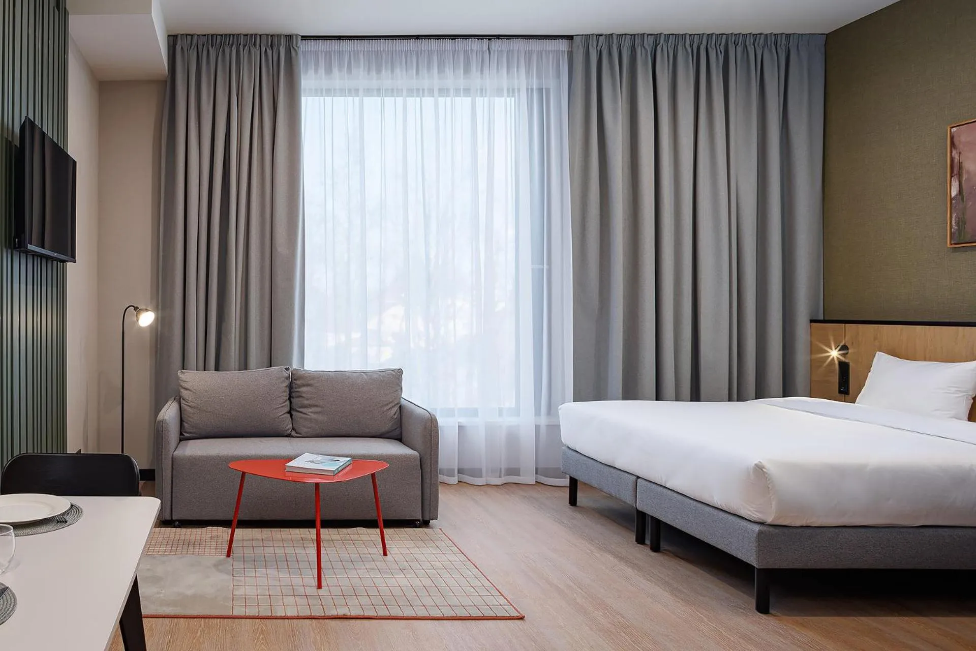 Living room, Bed in TULIP Residences Lviv