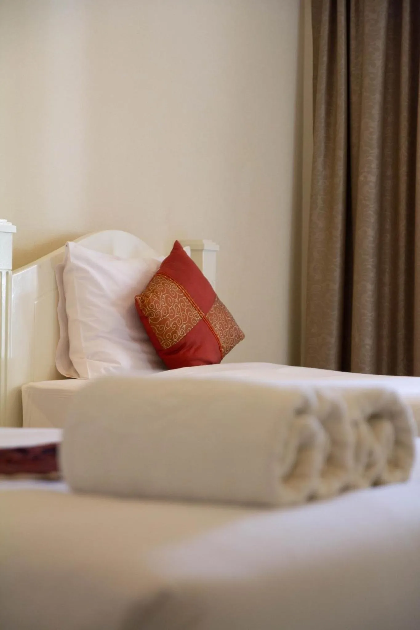 Bed in Grandsmile Wellness Resort