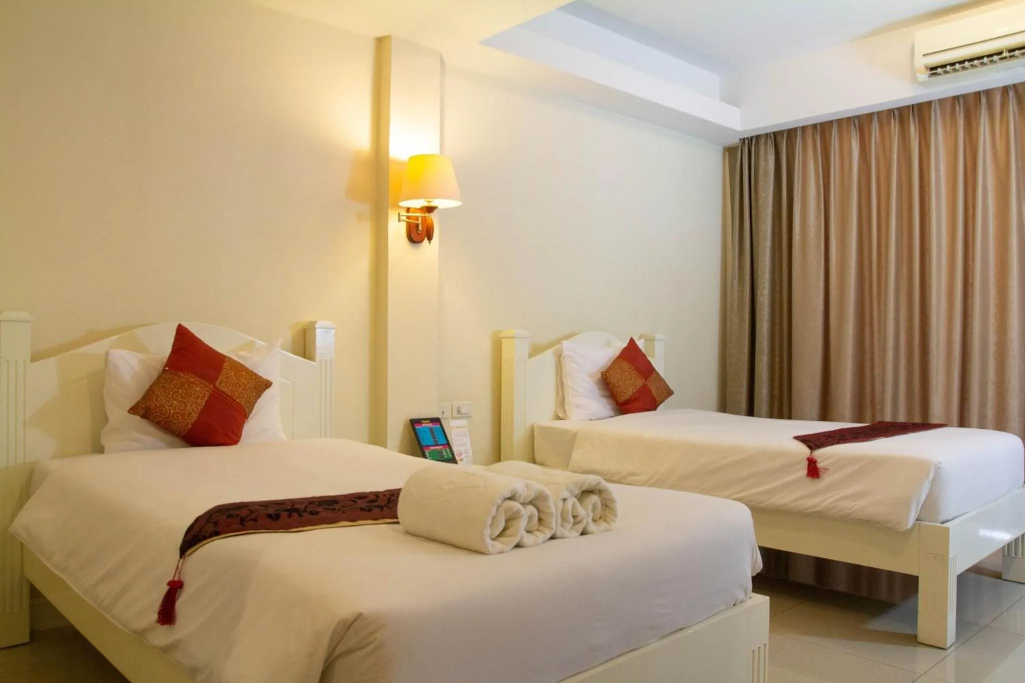 Bed in Grandsmile Wellness Resort