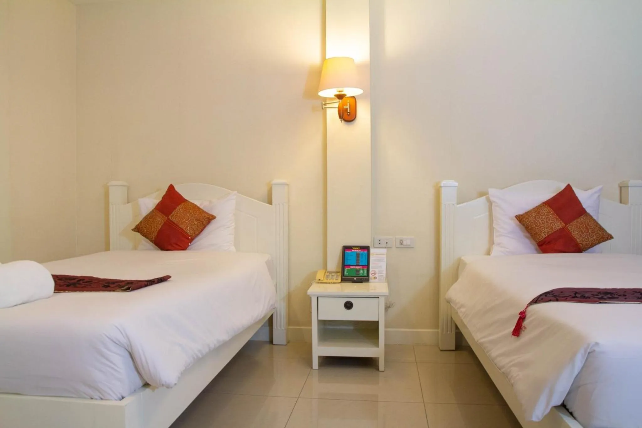 Bed in Grandsmile Wellness Resort