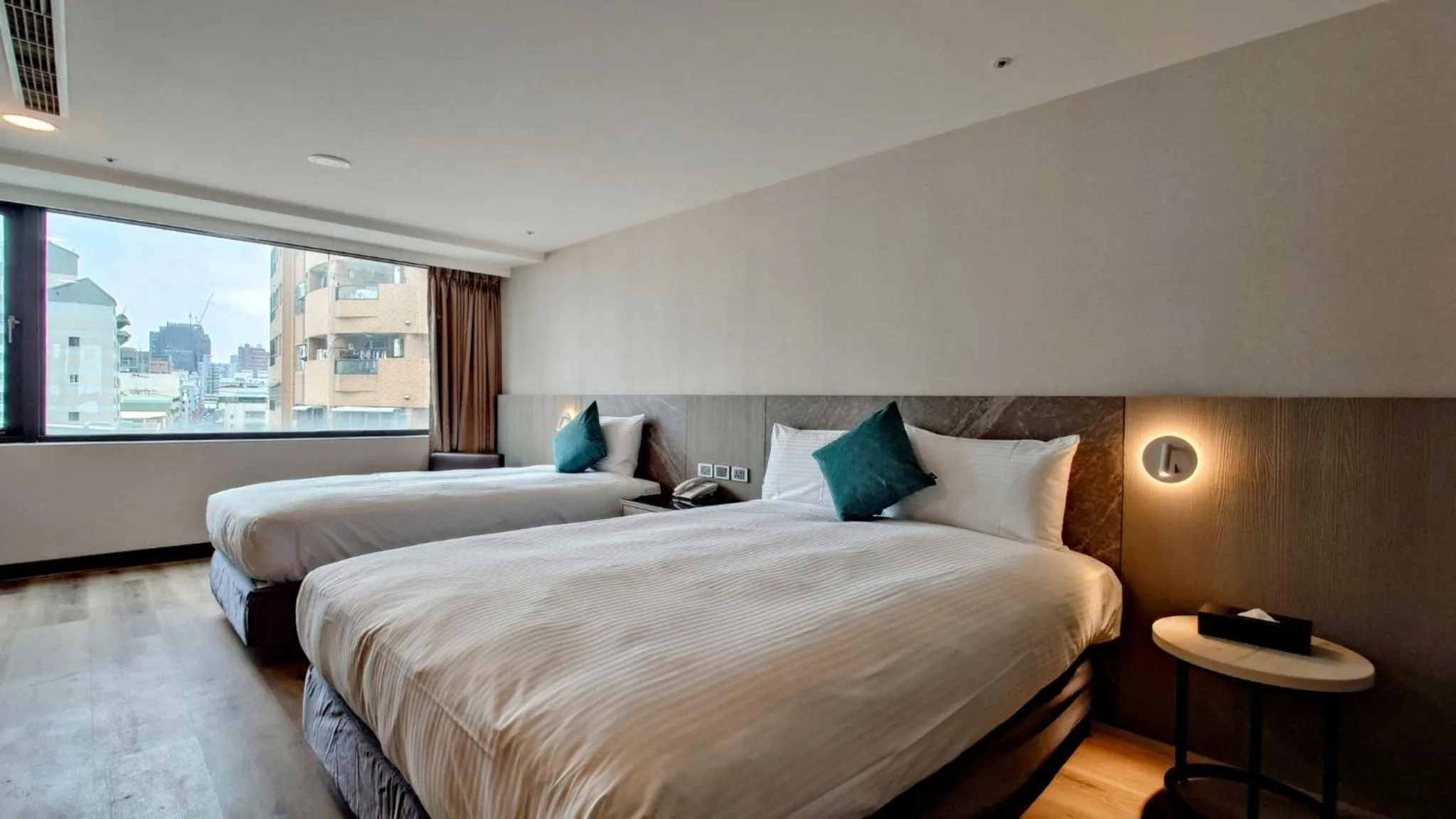 Bed in Hub Hotel Taichung Wenxin