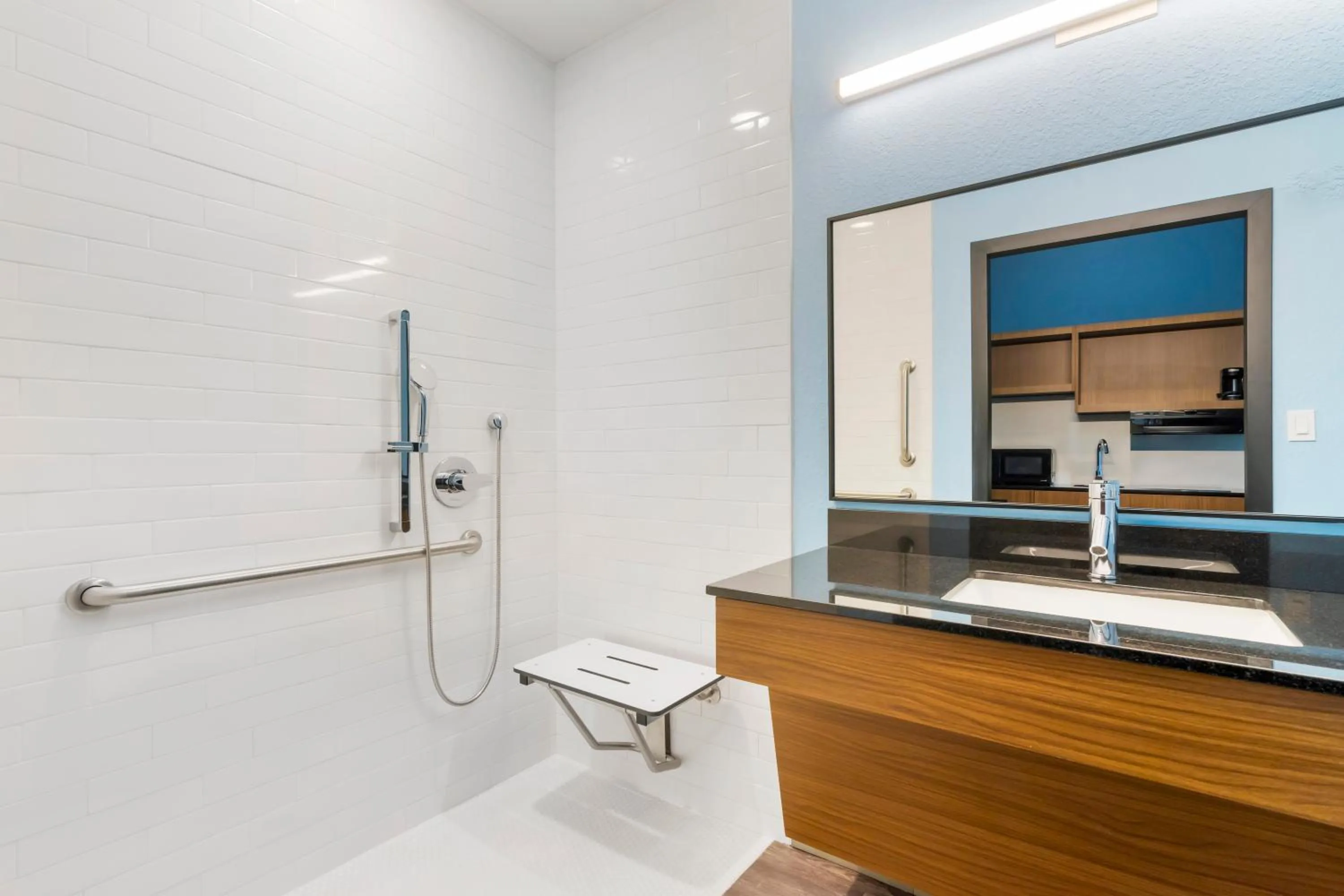 Bathroom in HomeTowne Studios by Red Roof Tampa - Airport