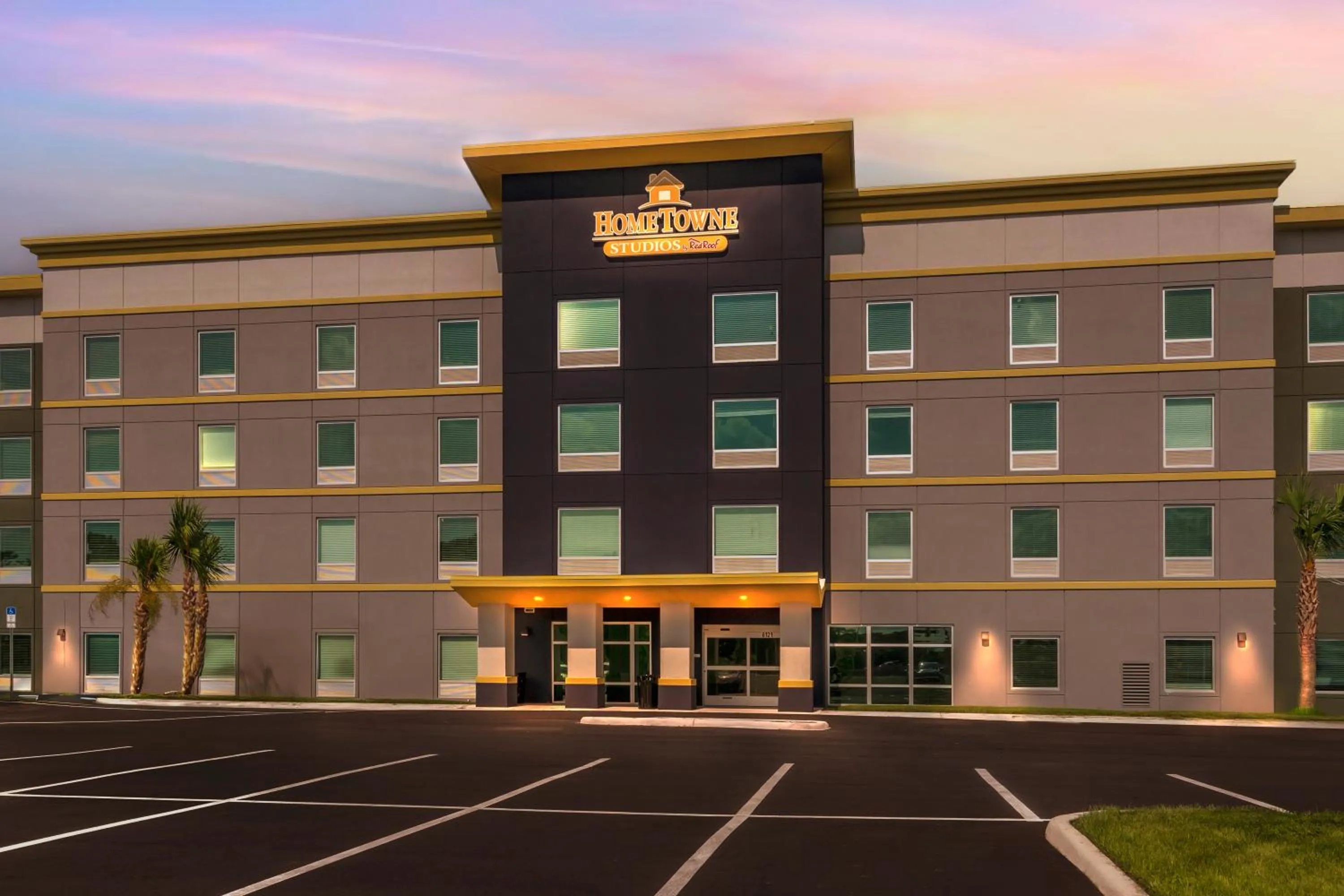 Property building in HomeTowne Studios by Red Roof Tampa - Airport