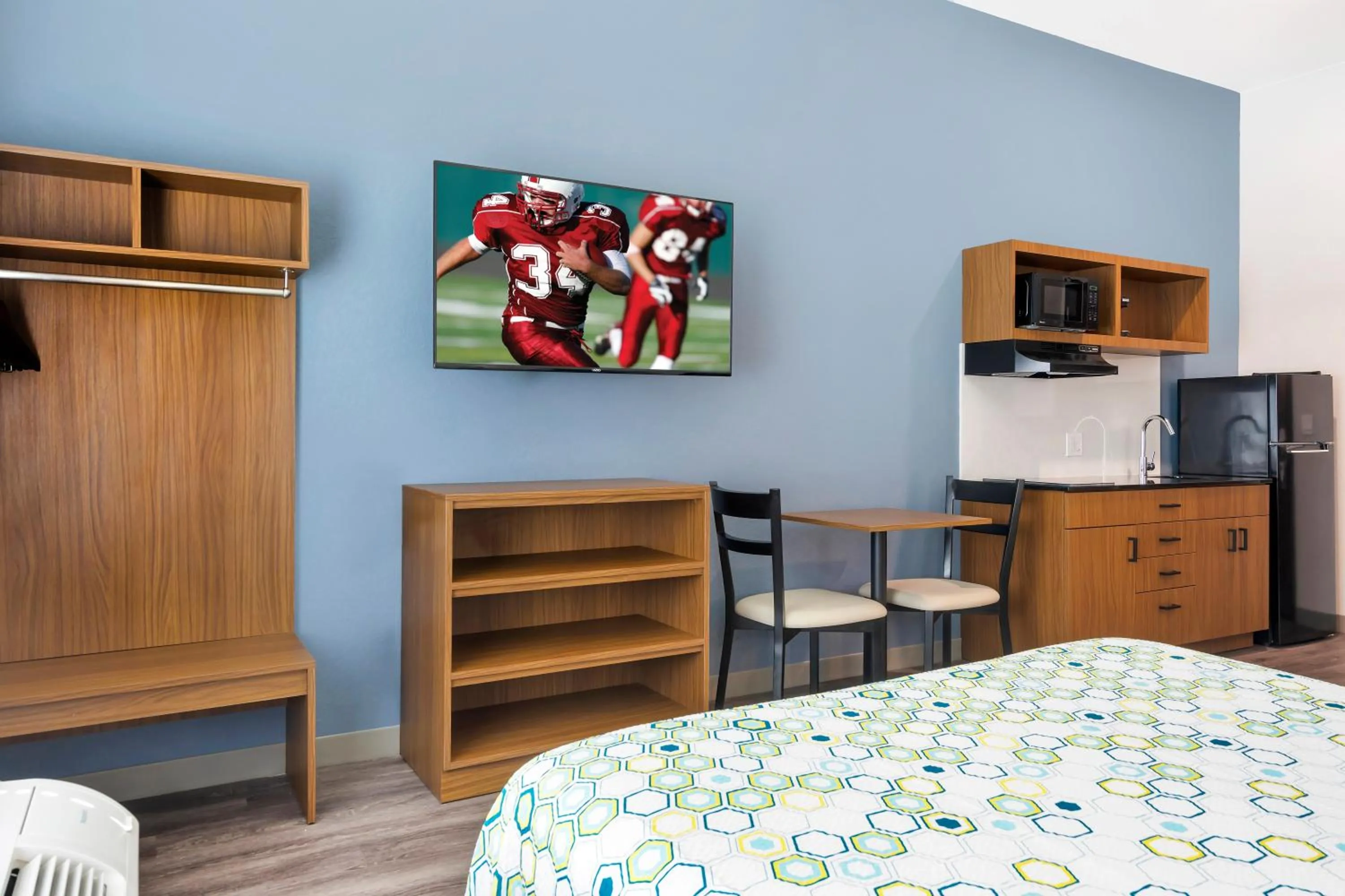 Bedroom, Bed in HomeTowne Studios by Red Roof Tampa - Airport