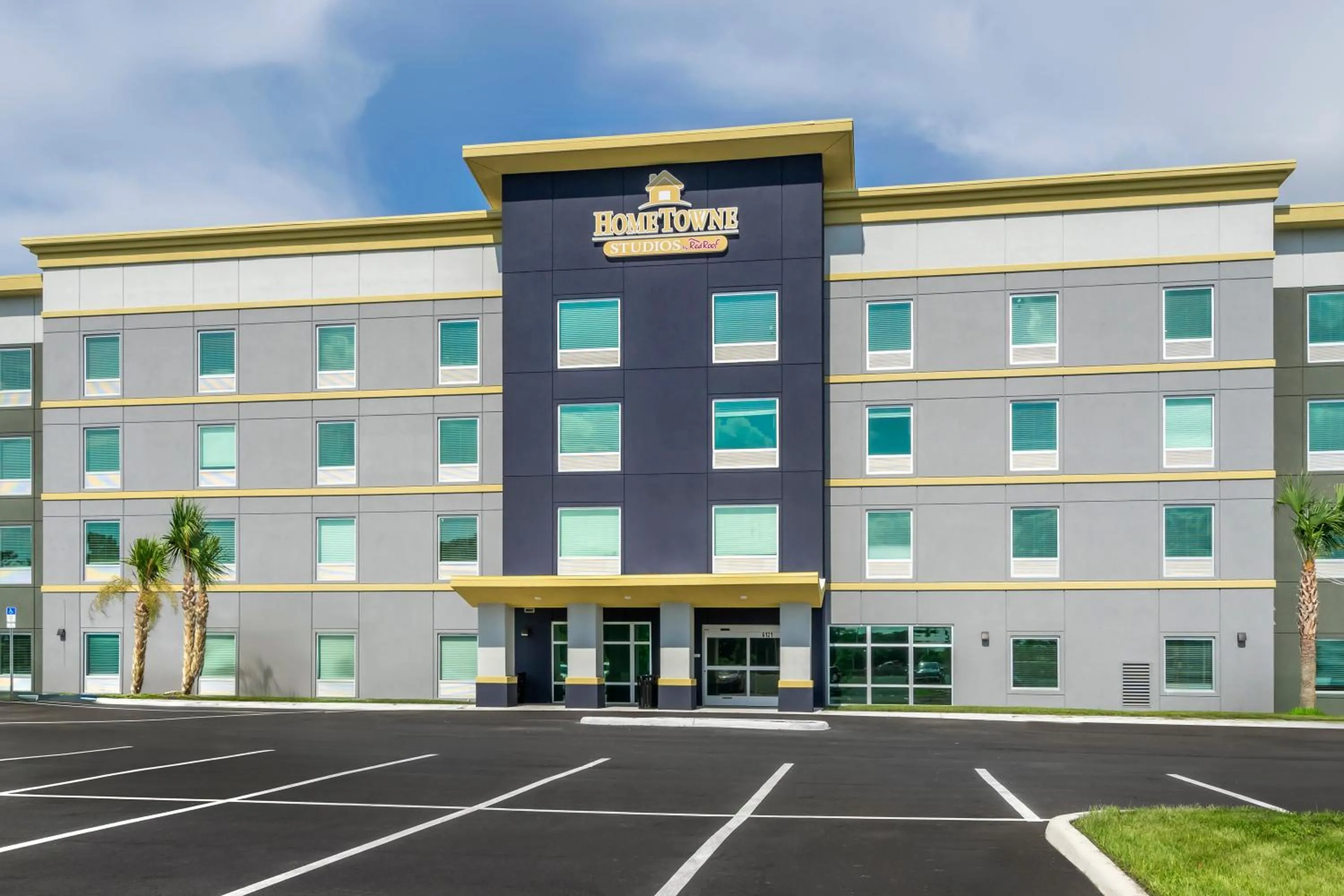 Property building in HomeTowne Studios by Red Roof Tampa - Airport