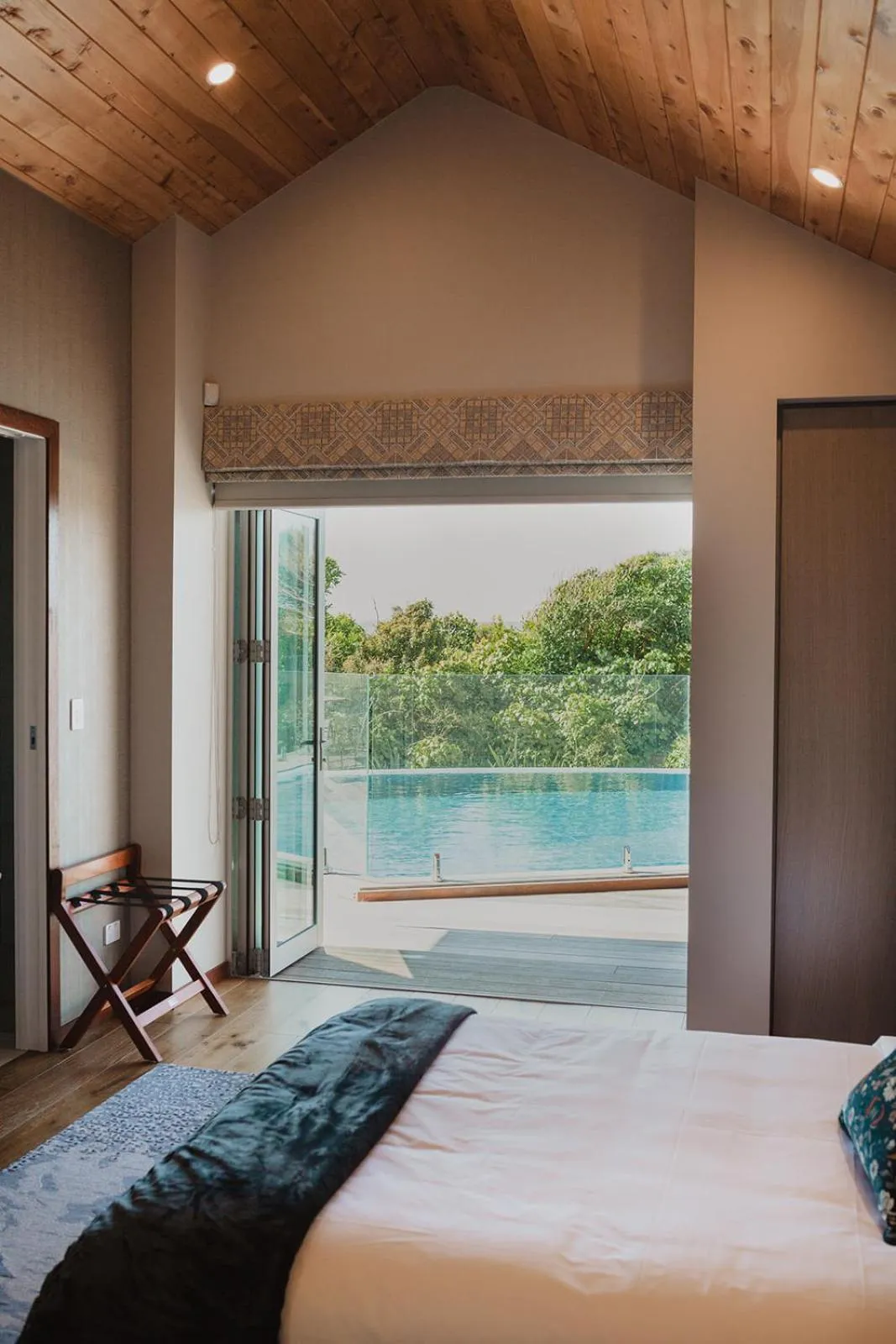 Swimming pool, Bed in Te Whaanga Retreat & Spa