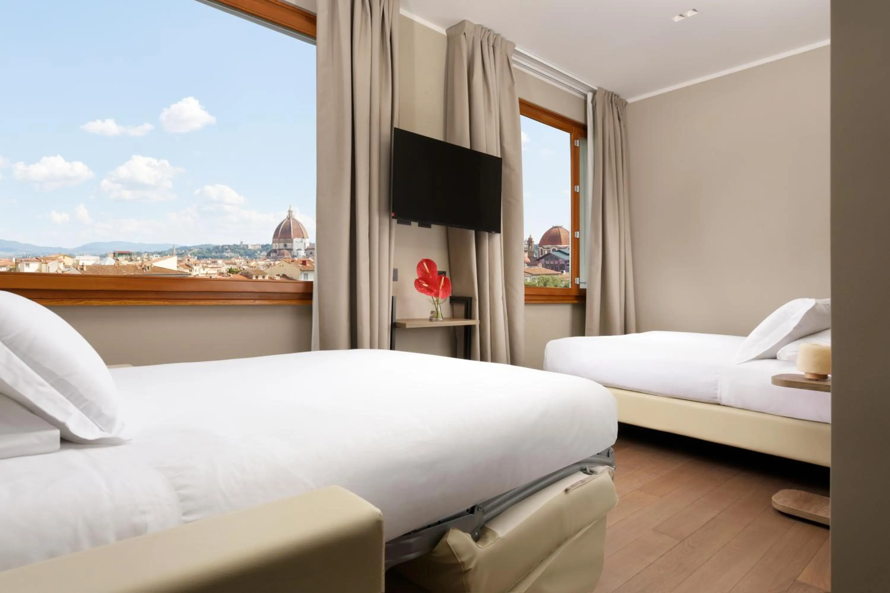 Bed in Essence Hotel