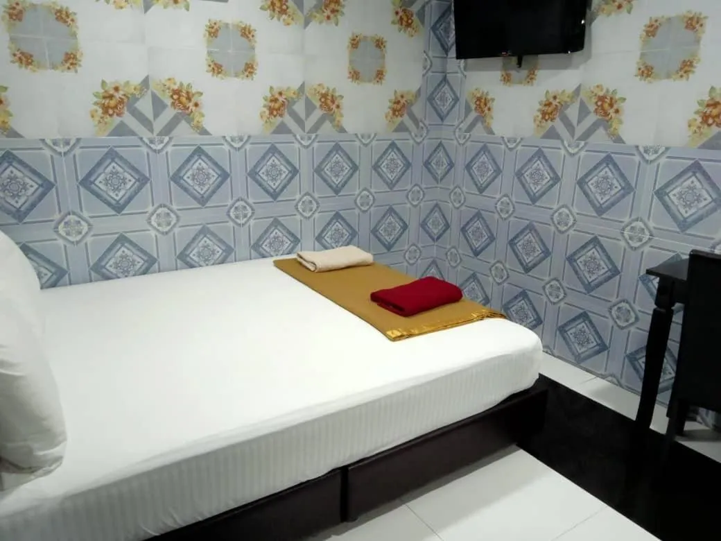 Bed in Kuala Selangor Hotel