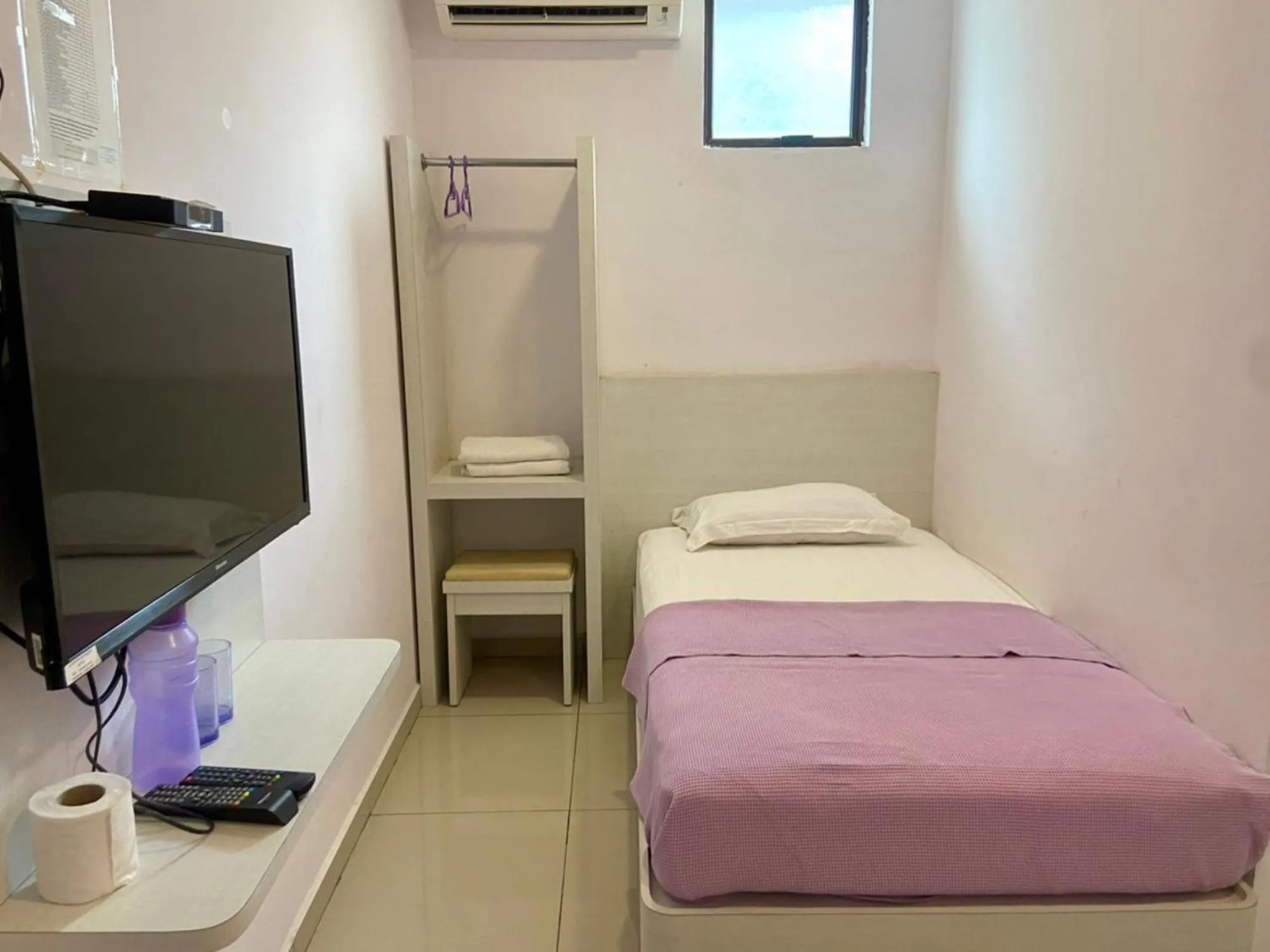 Bed in Lavender Riverside Hotel