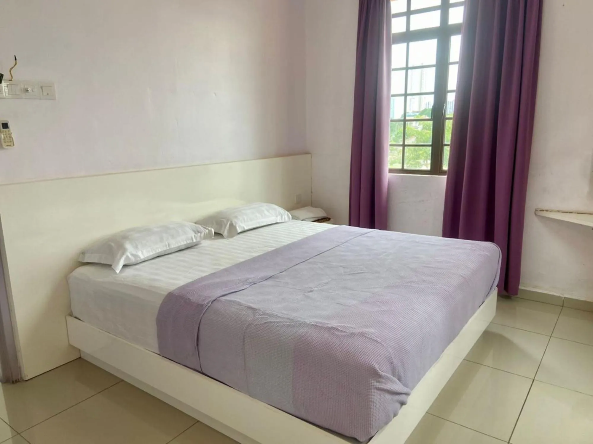 Bed in Lavender Riverside Hotel