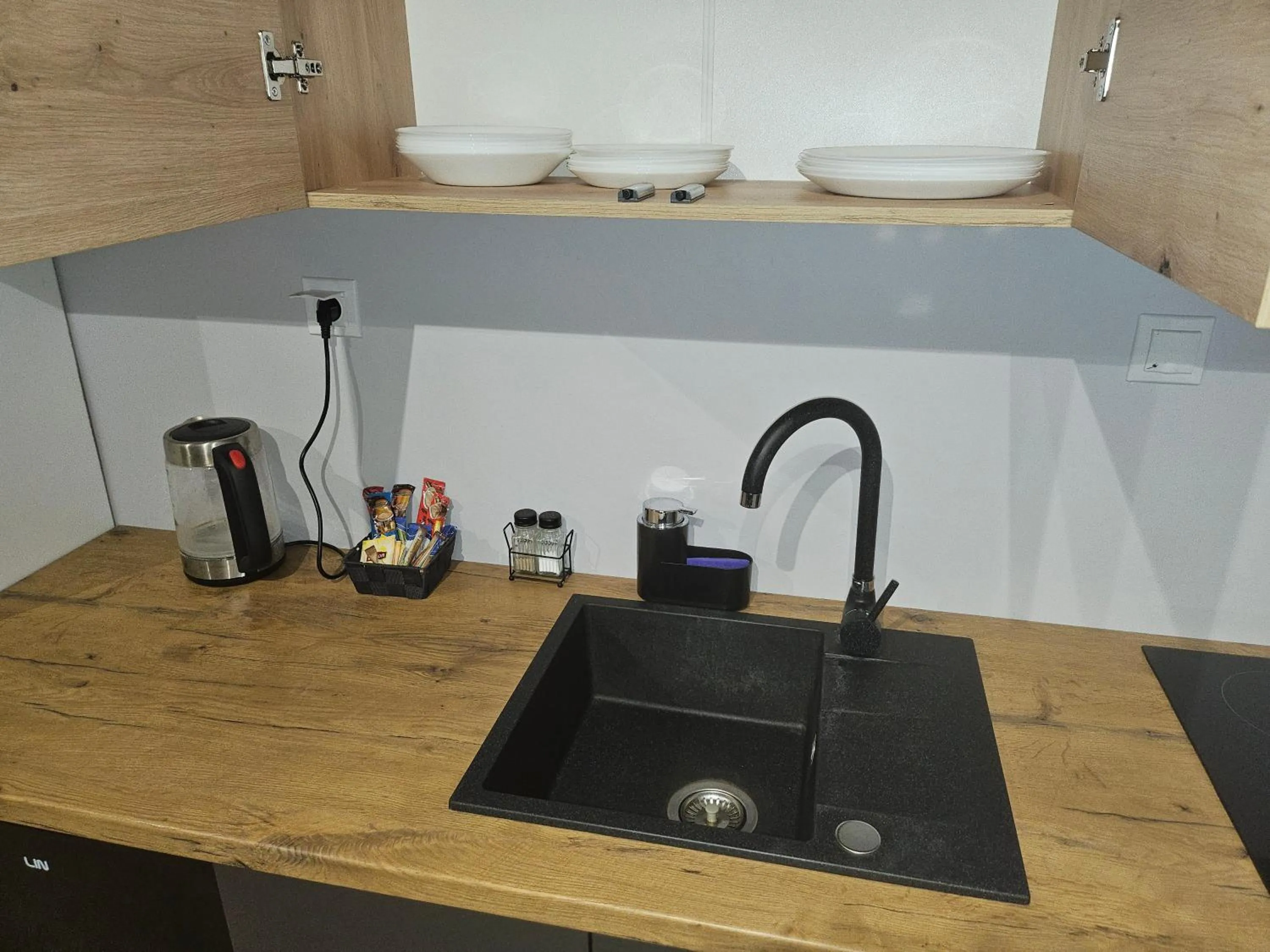 Kitchen or kitchenette in Aparthotel Warszawa