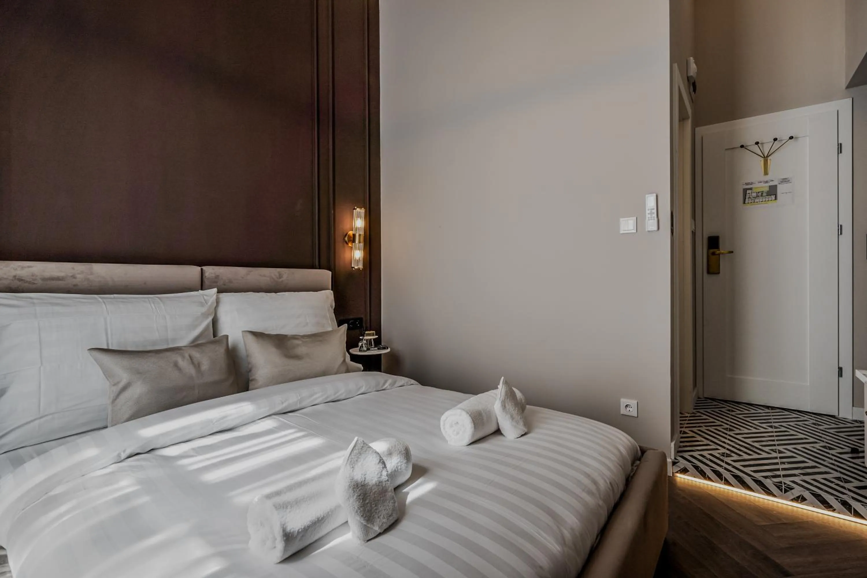 Bed in Timeless Boutique Suites by BQA