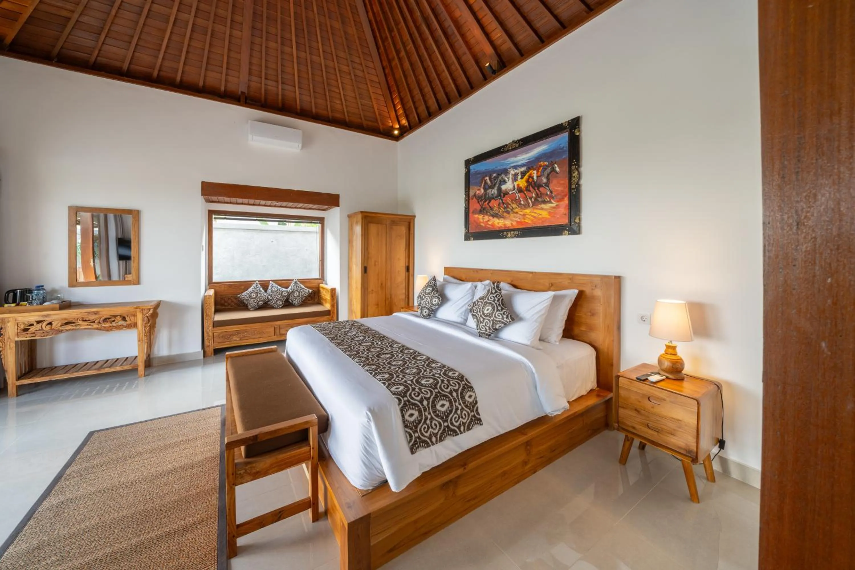 Bed in Kaki Uma Villa