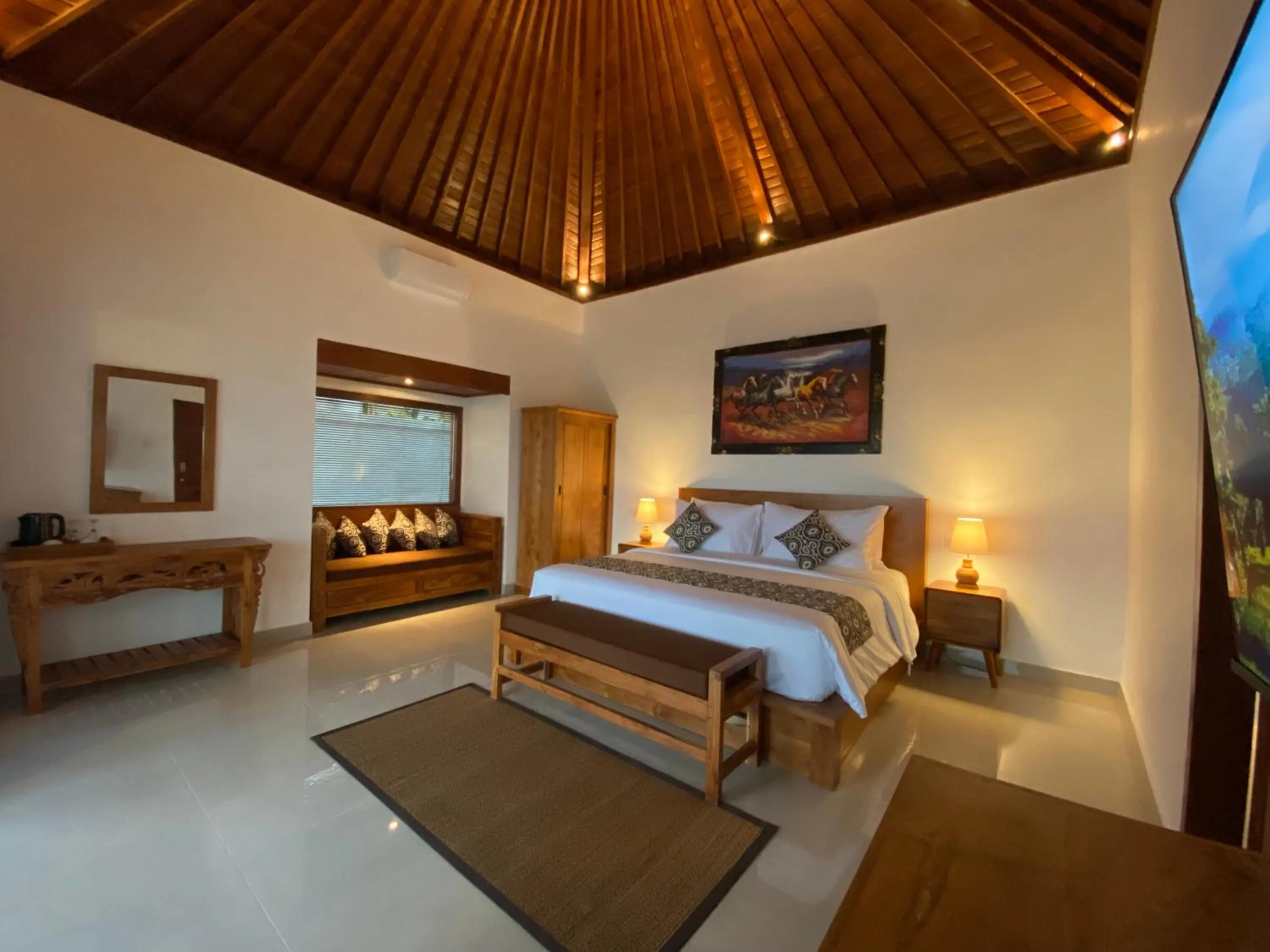 Bed in Kaki Uma Villa