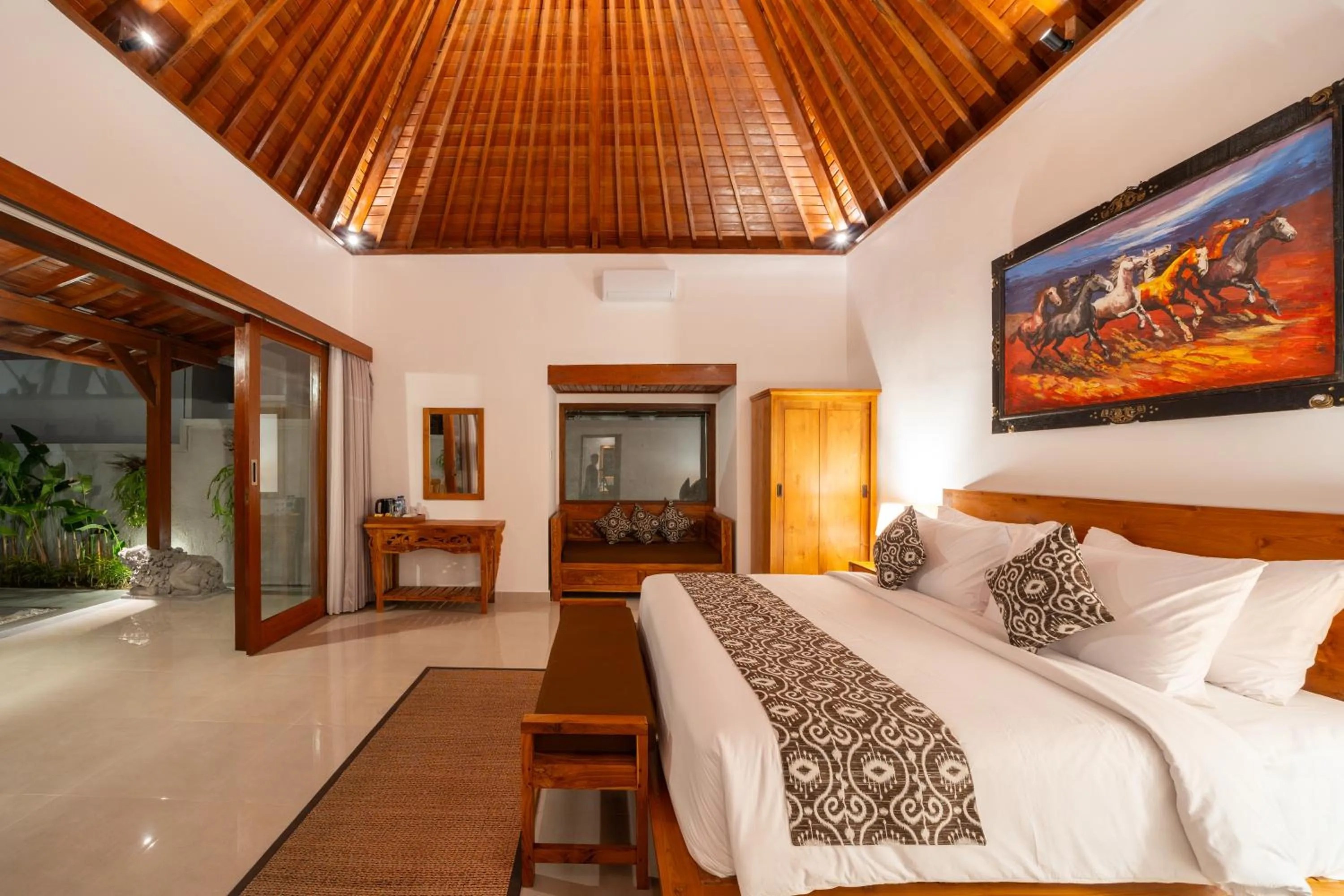 Bed in Kaki Uma Villa