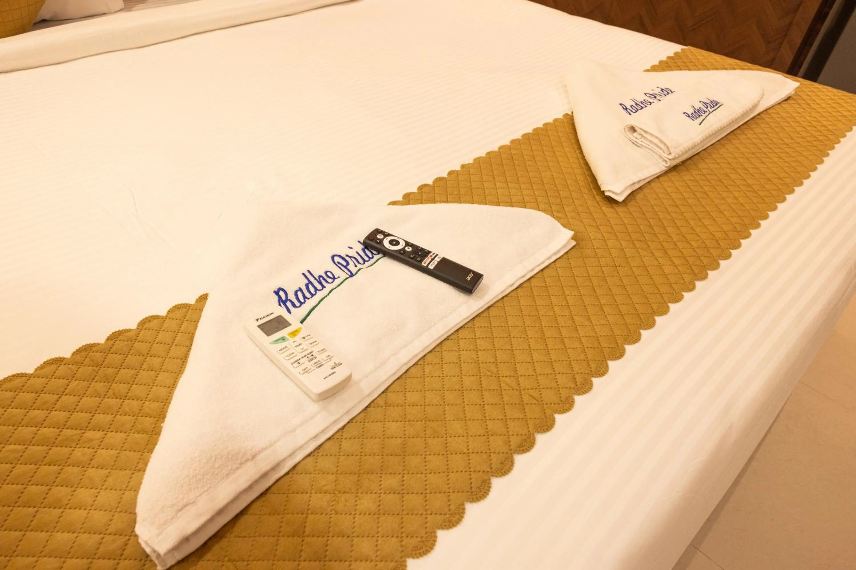 Bed in Hotel Radhe Pride Hitech City