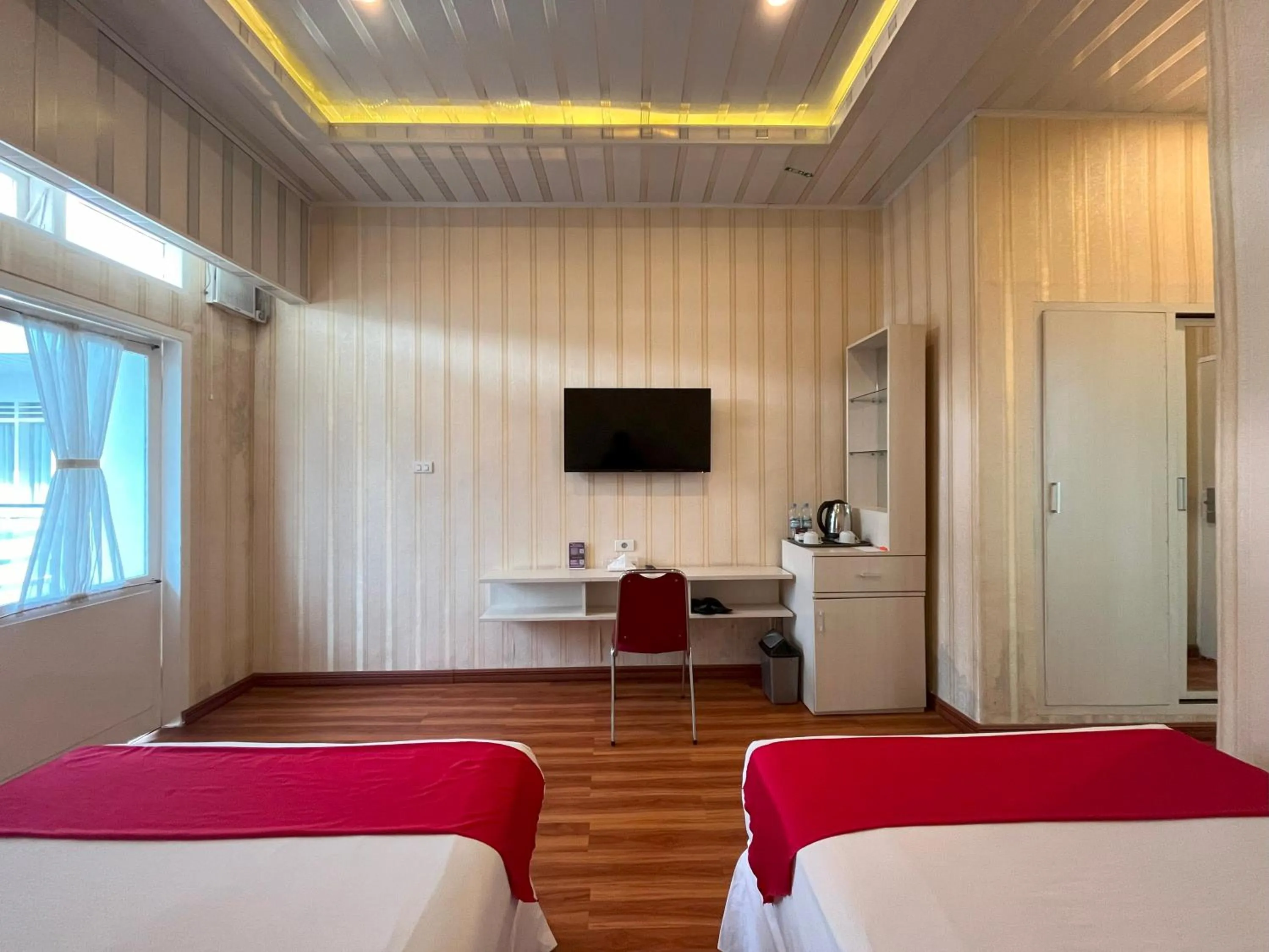 Bed in Grand Tamaro Hotel